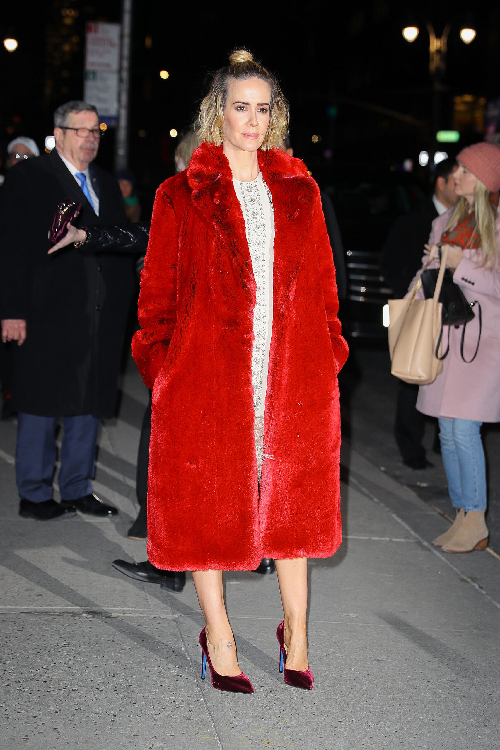 Sarah Paulson wears a red coat while arriving at The Late Show with Stephen Colbert in NYC on Jan 17 2019