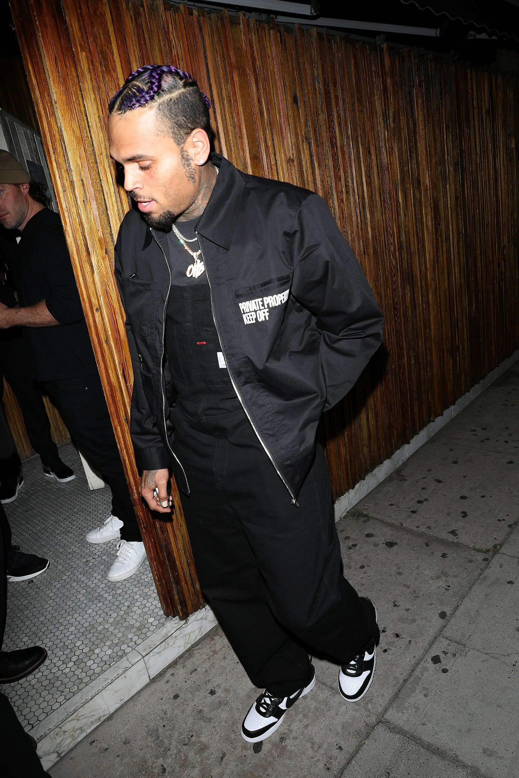 Singer Chris Brown is disappointed as he leaves the Nice Guy after a driver crashes into another car which hits his car