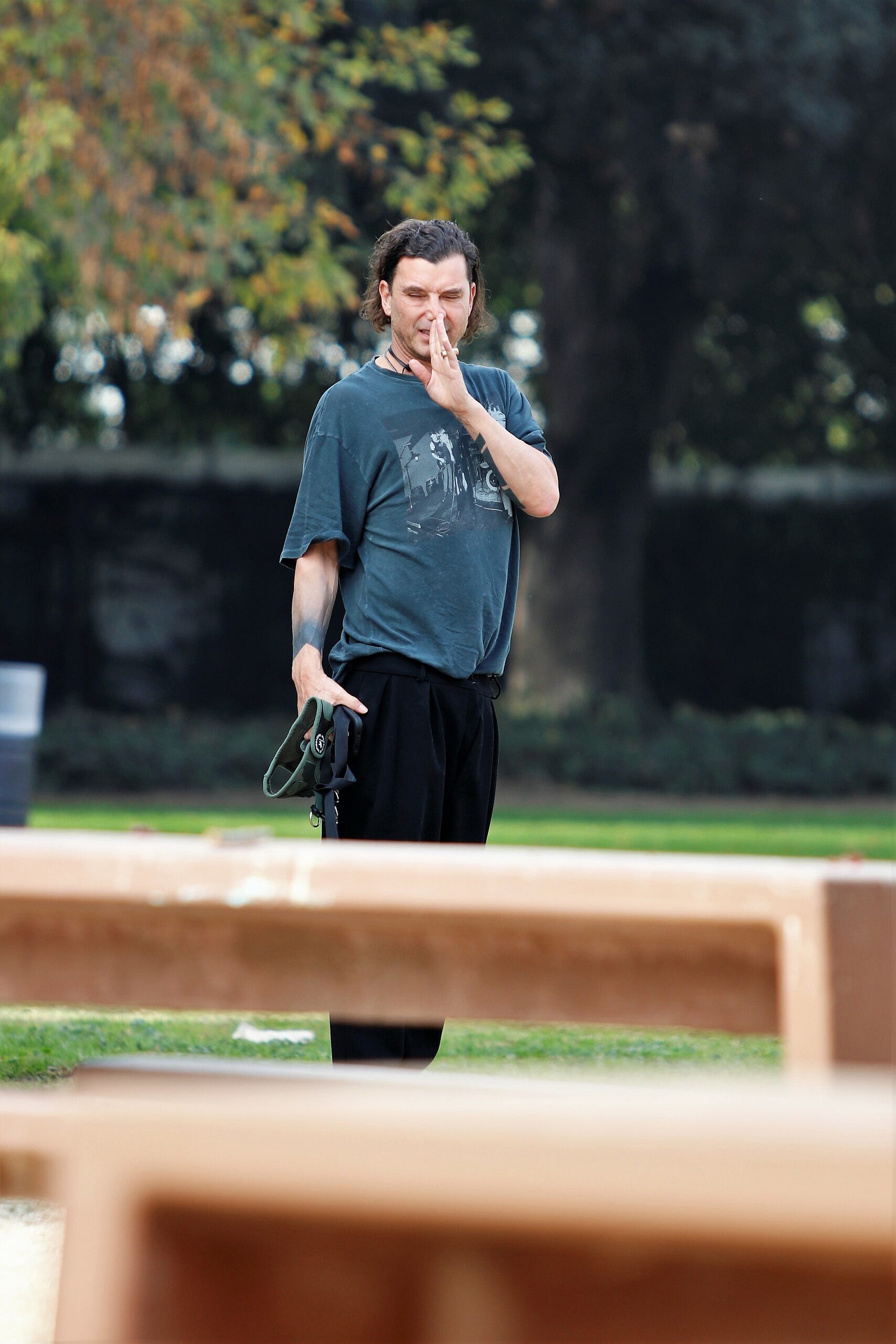 Gavin Rossale is seen in the park whilst out in Studio City