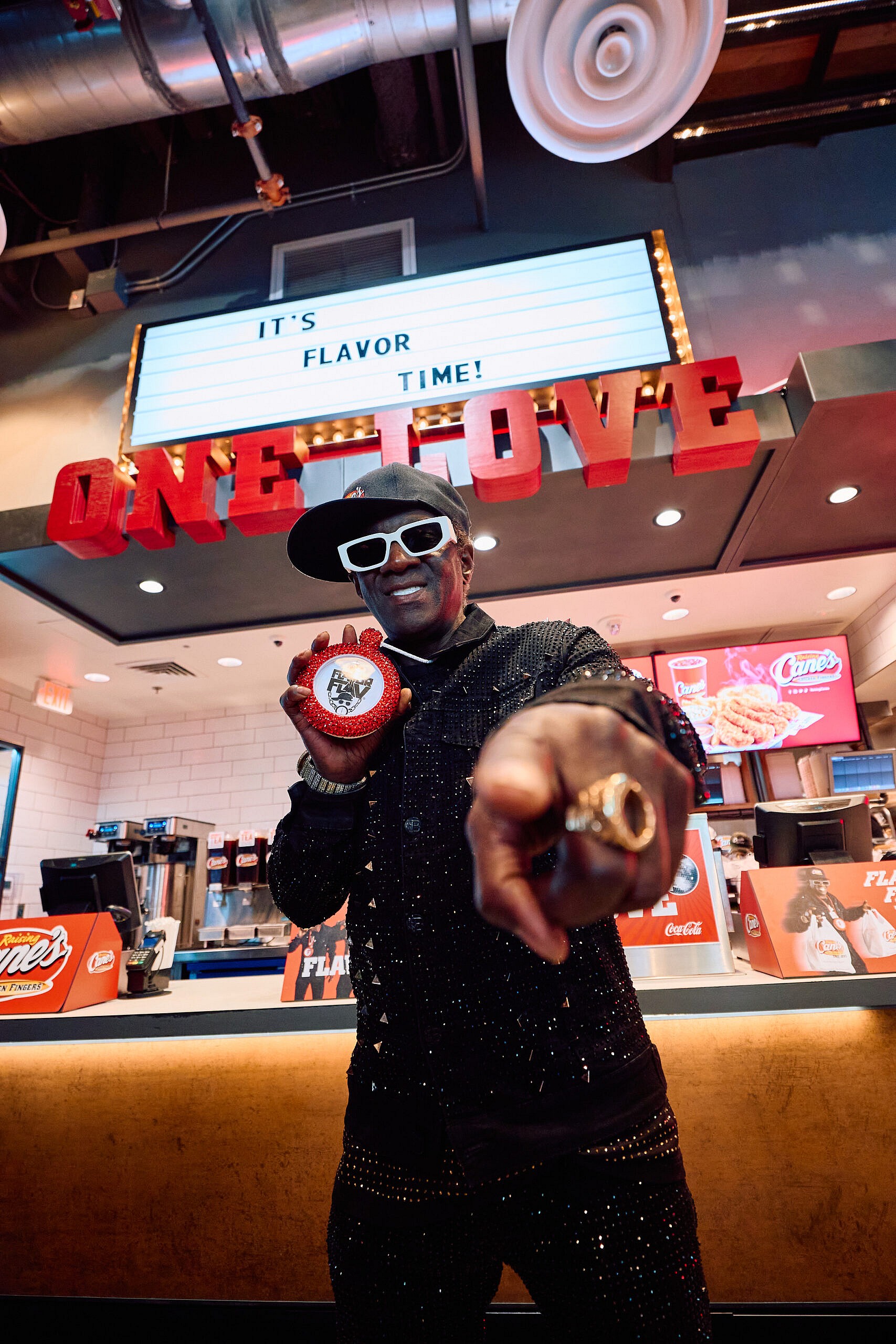 Pop Culture Icon Flavor Flav Works "Shift" at Raising Cane's Las Vegas Ahead of Cane's New "Flavor Fast" Campaign