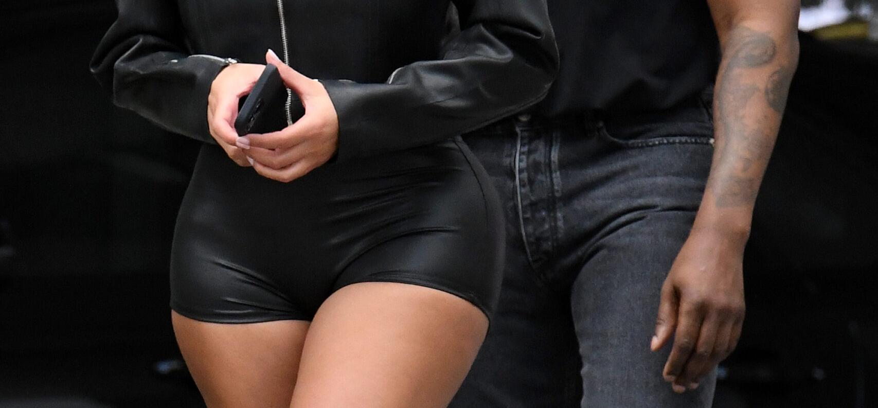 A newly single Kanye West is seen leaving his hotel with new girlfriend Chaney Jones in Miami