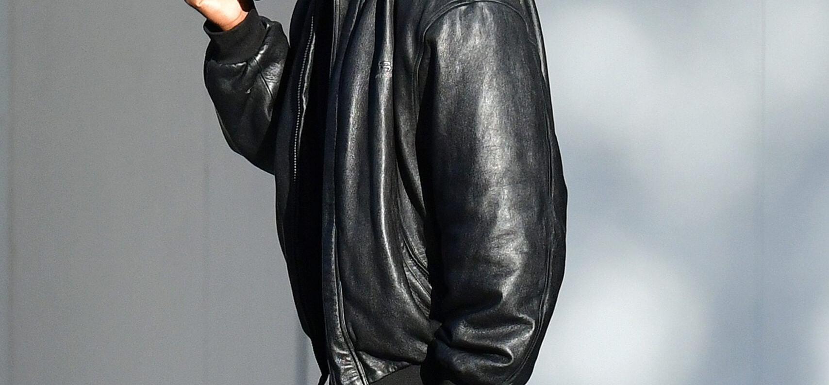 Kanye West is back in his boots as he makes his way around Miami