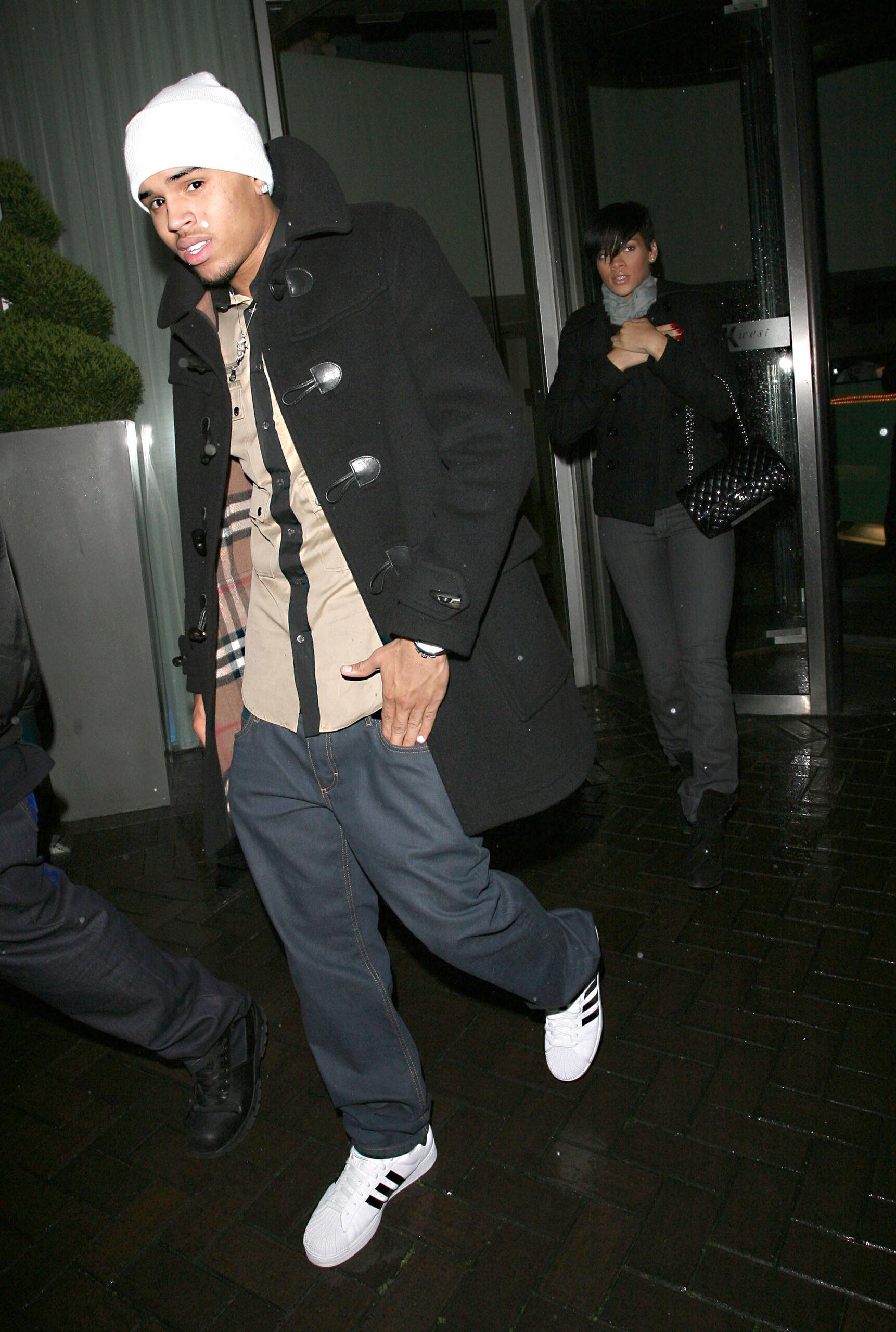 Rihanna and her boyfriend Chris Brown pictured together for the first time leaving the K West Hotel in Shepherd apos s Bush for an evening at Maya nightclub