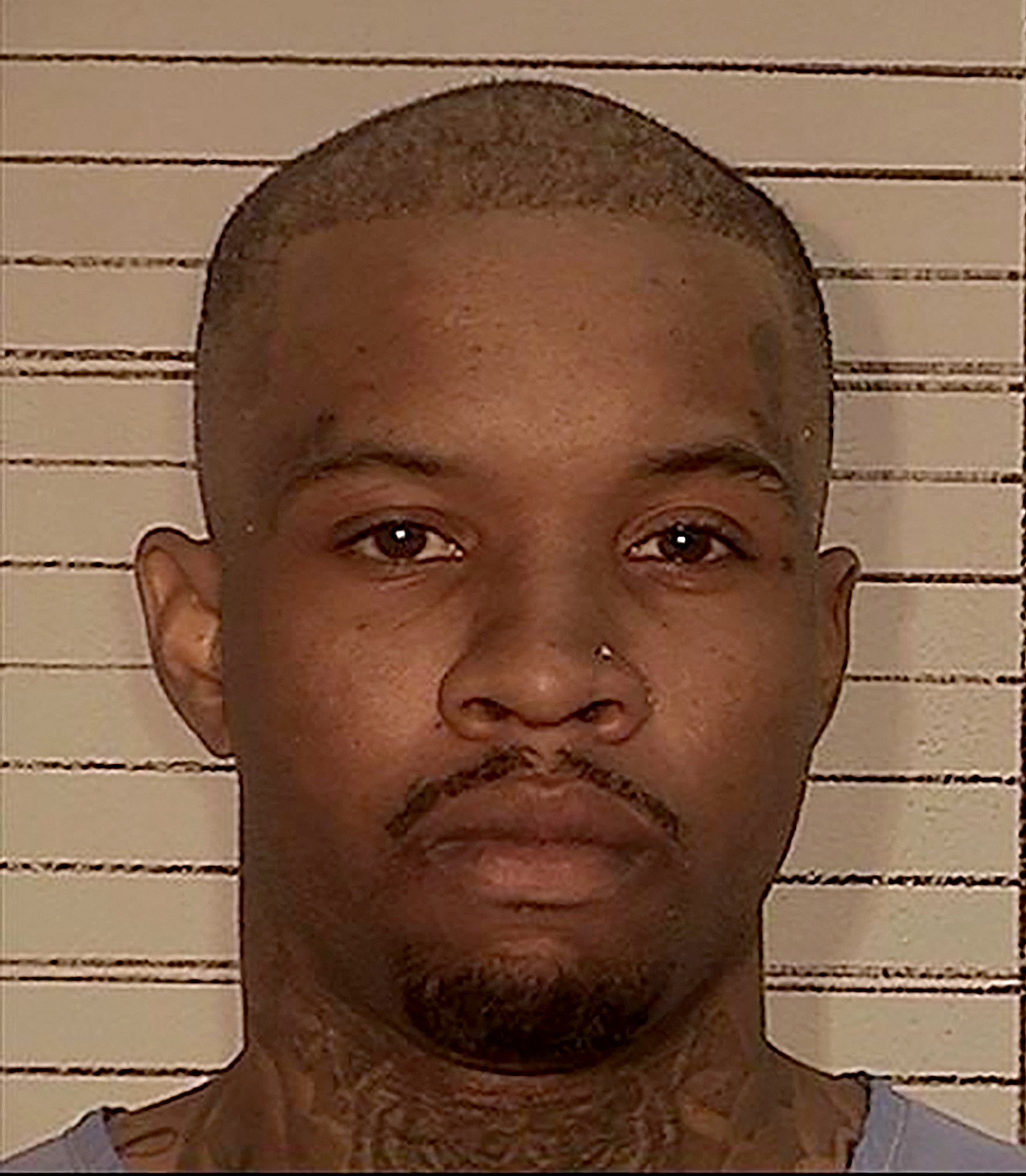 Tory Lanez mugshot after being convicted of shooting musician Megan Thee Stallion in the foot.