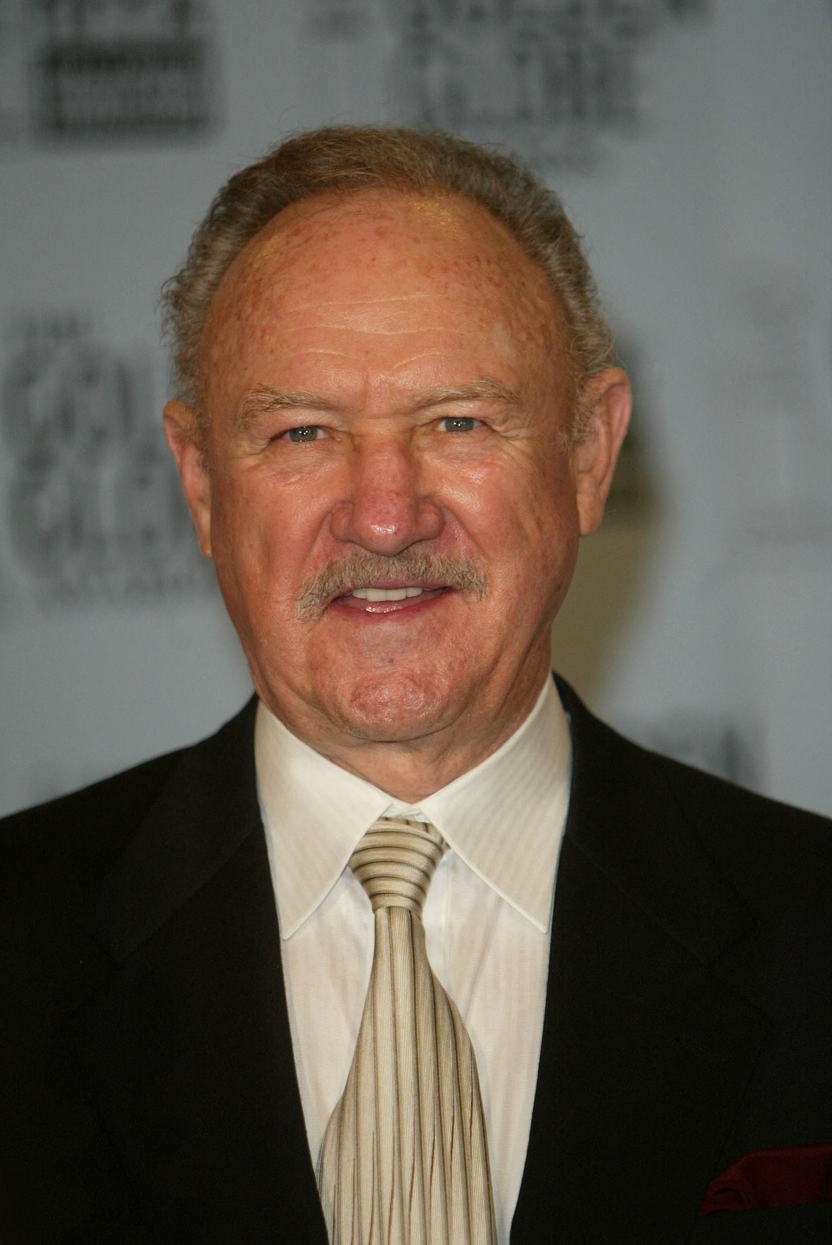 Gene Hackman wearing black