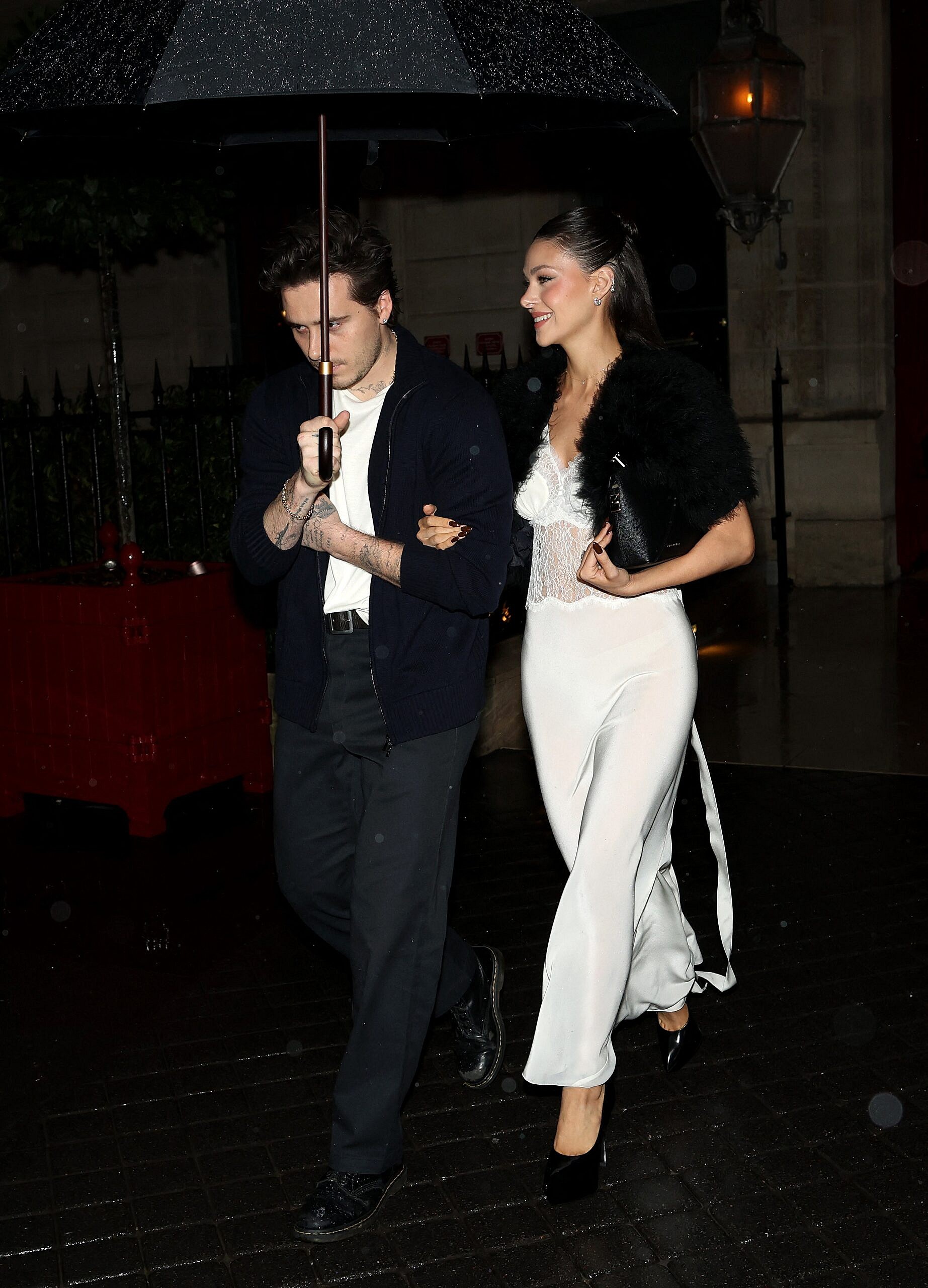 David and victoria Beckham , Nicola Peltz Beckham and Brooklyn Peltz Beckham leave their hotel to go to dinner.