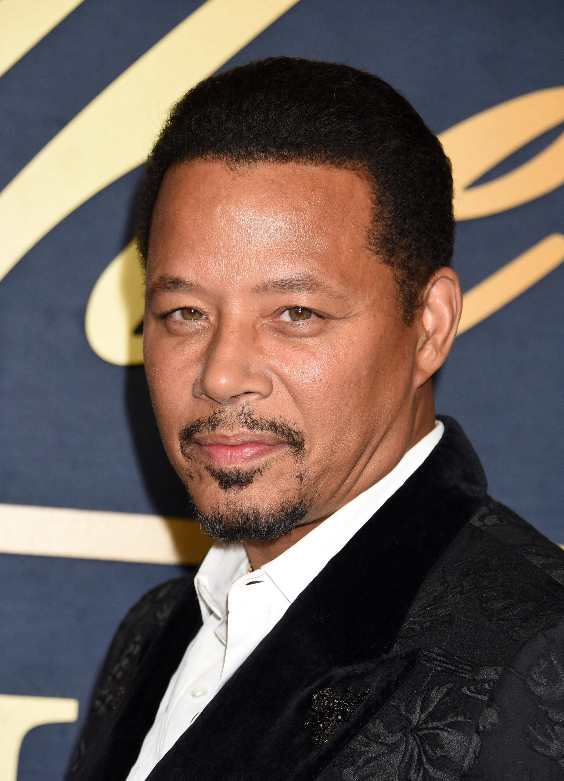 Terrence Howard posing on the red carpet.