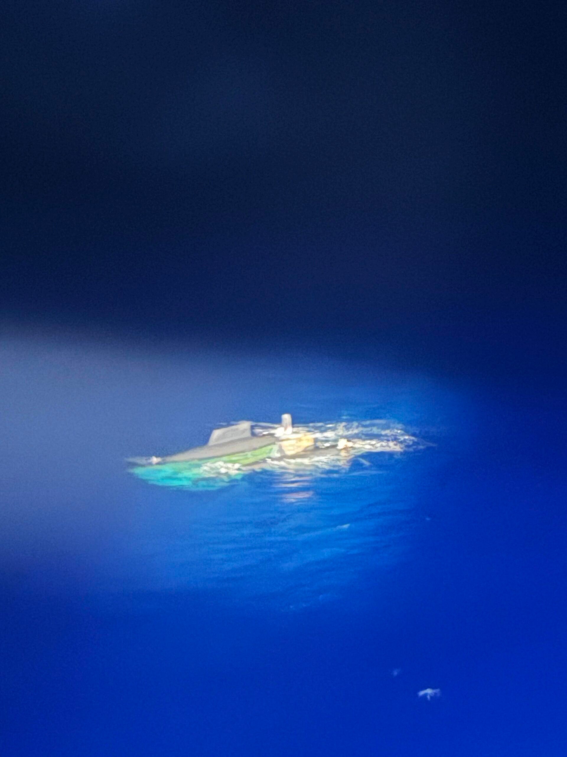 Capsized boat in the water