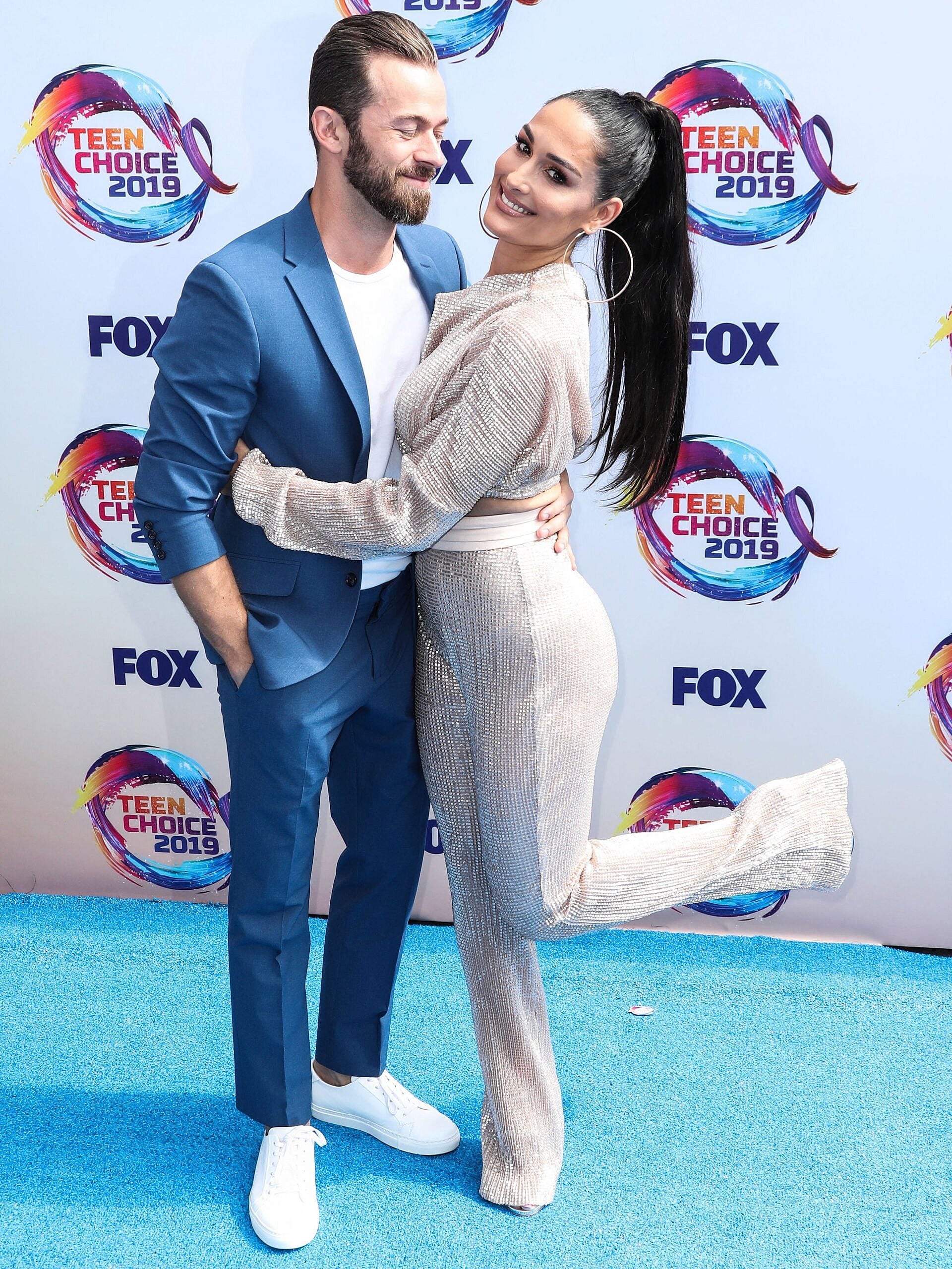 Nikki Garcia and Artem Chigvintsev at FOX's Teen Choice Awards 2019