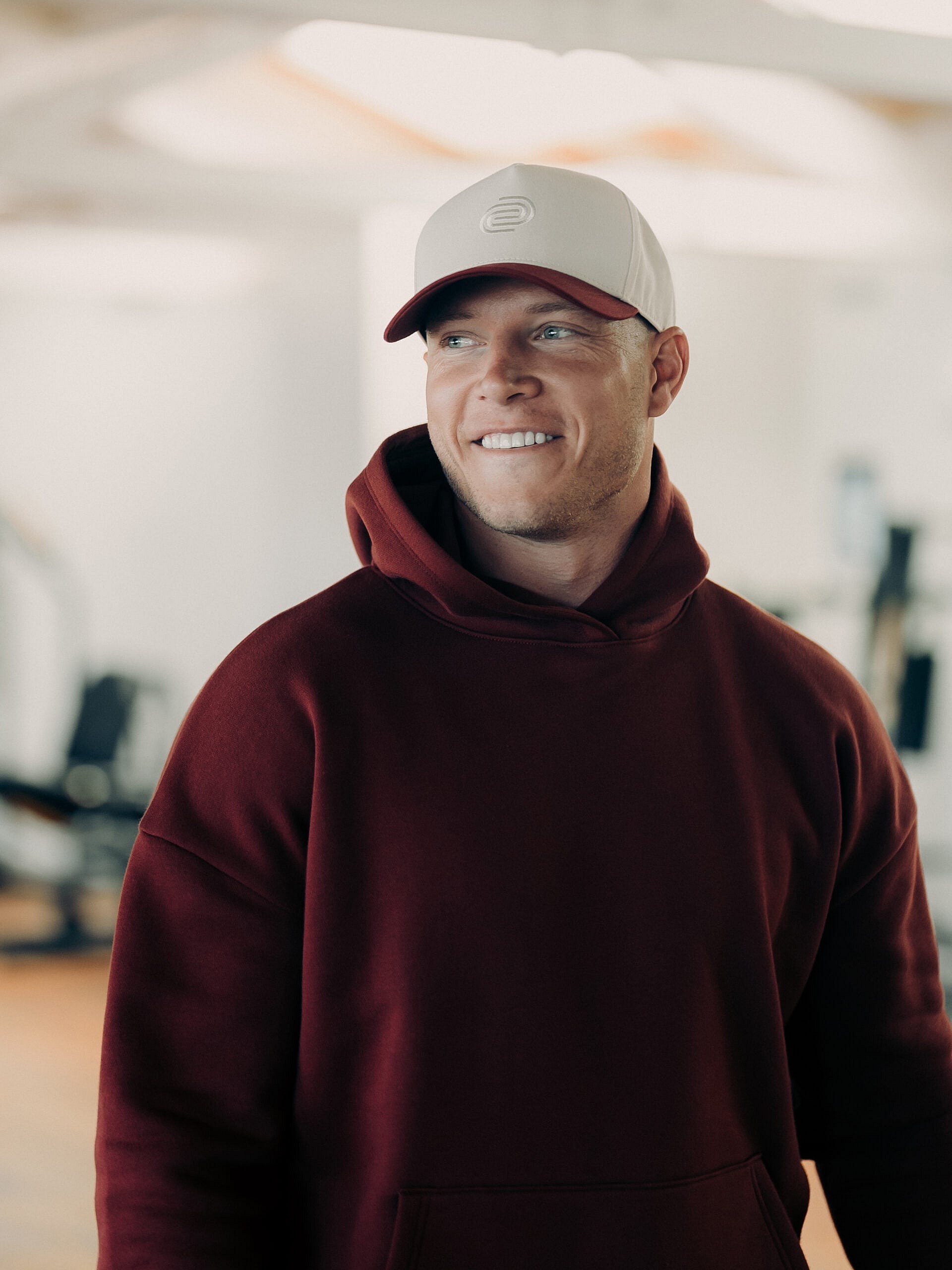 Christian McCaffrey wearing a hat