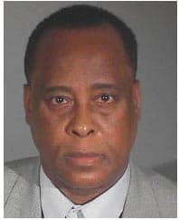 Dr. Conrad Murray listens as Judge Michael Pastor sentences him to four years