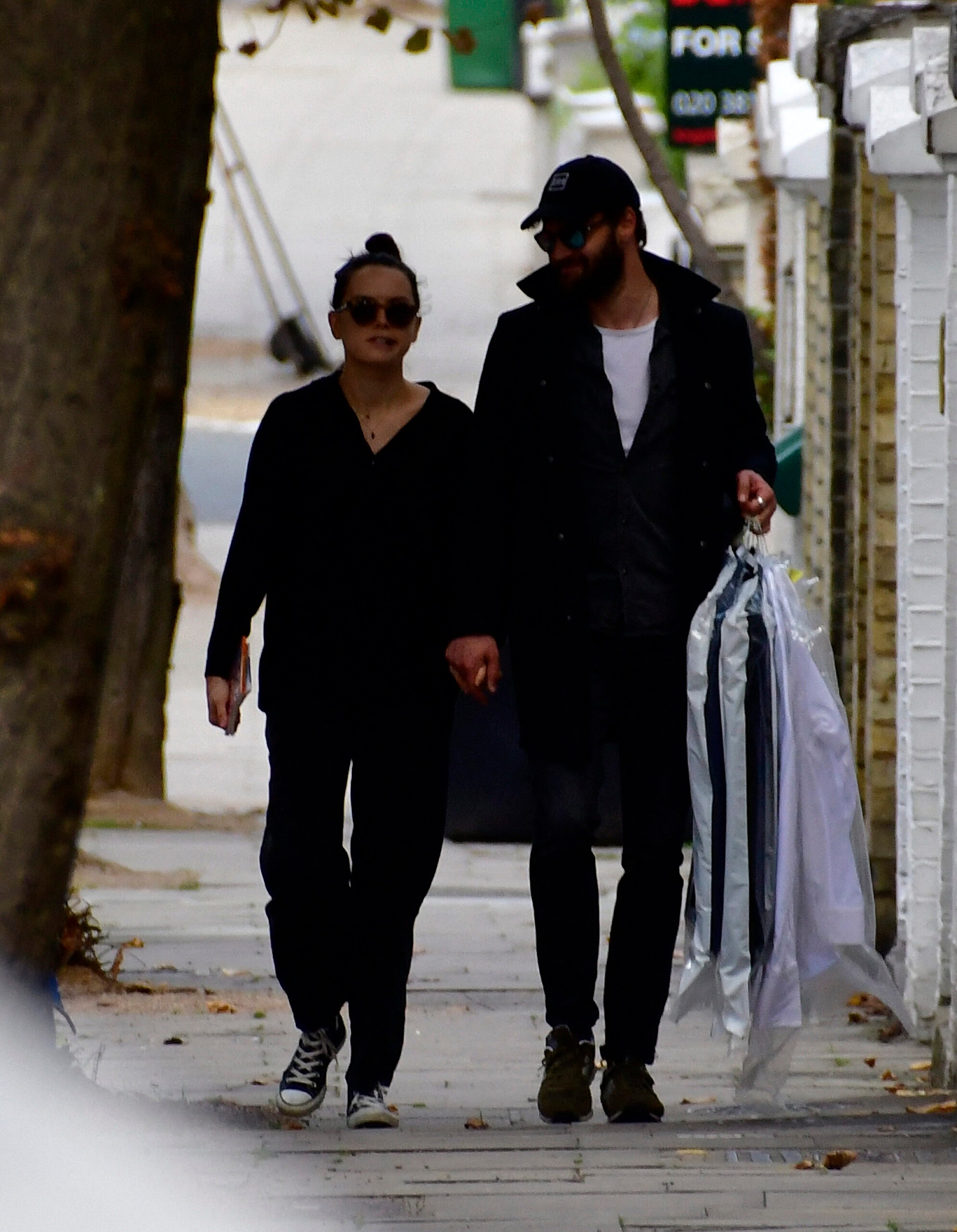 Daisy Ridley and Tom Bateman walking around Primrose Hill