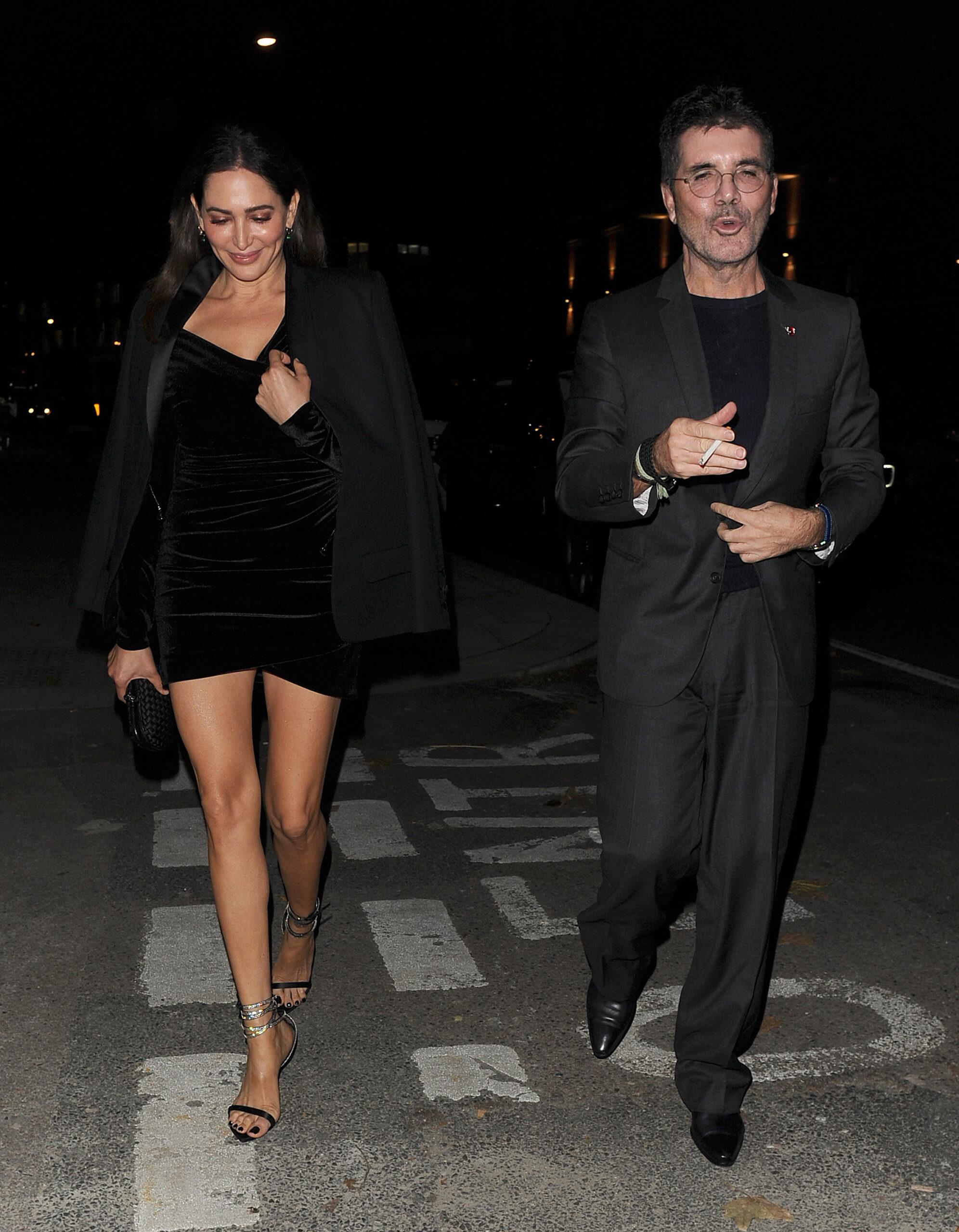 Lauren Silverman & Simon Cowell leaving the Shaftsbury Theatre