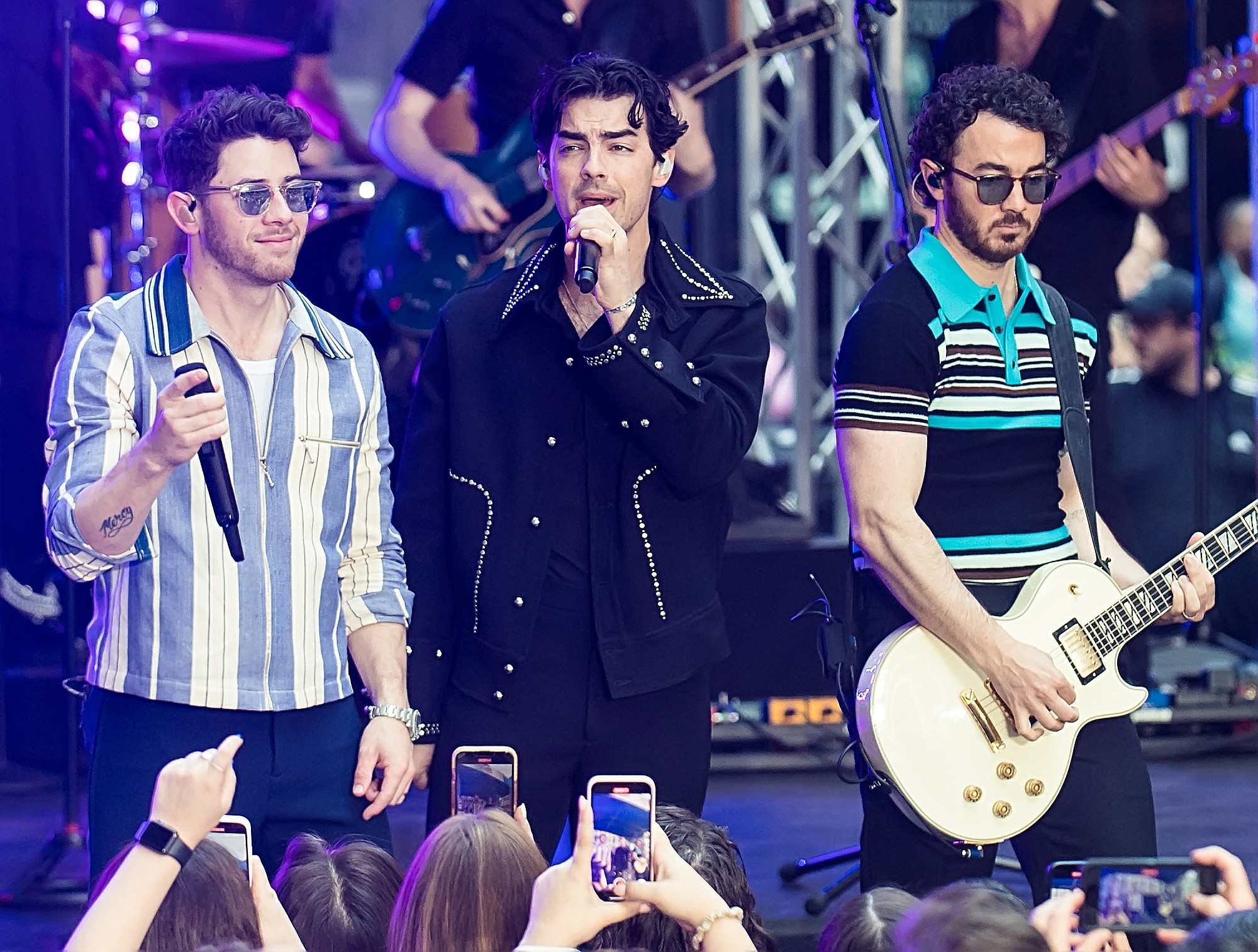 Nick, Kevin, and Joe Jonas on stage on Today show