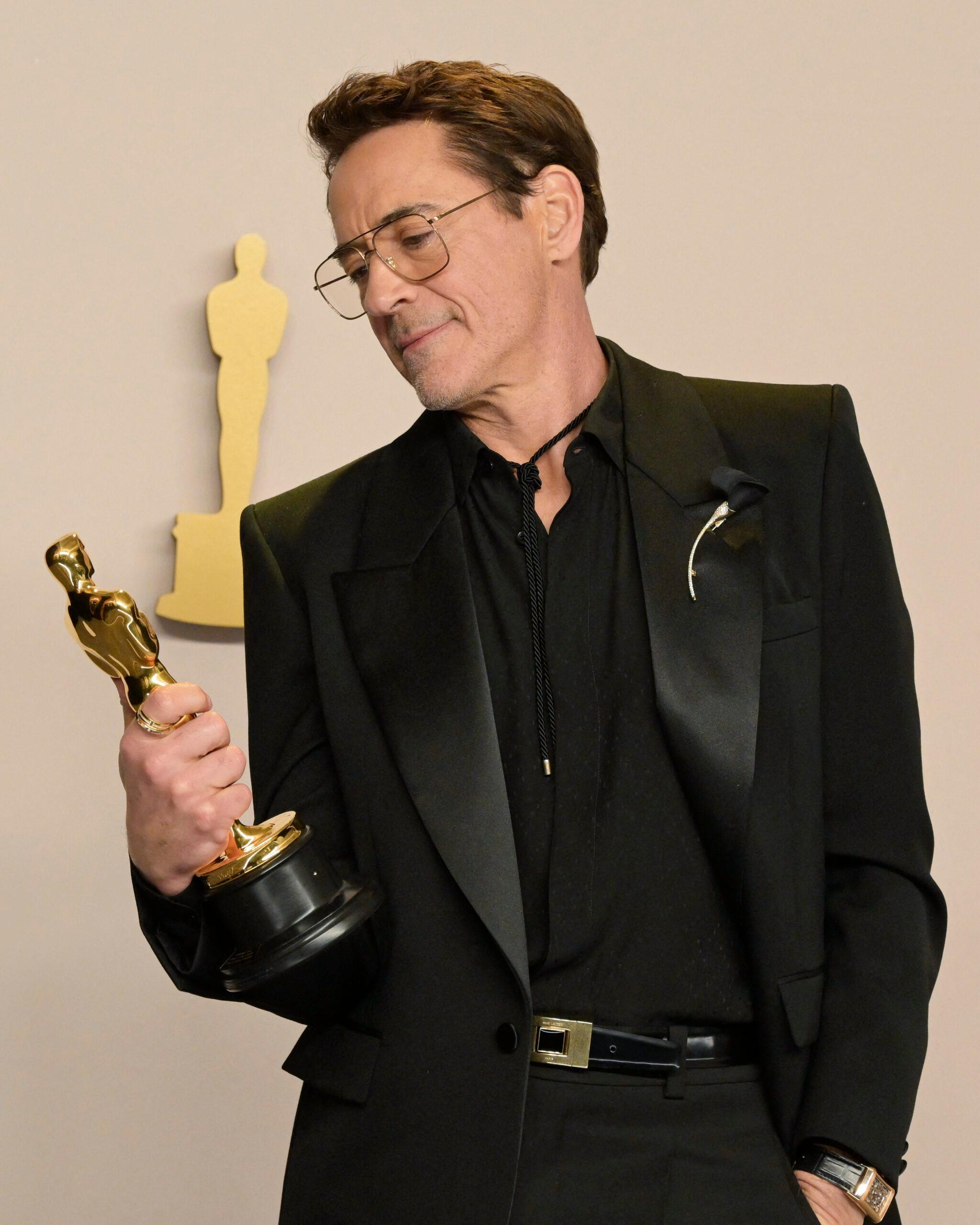 Robert Downey Jr. poses backstage at the Oscars