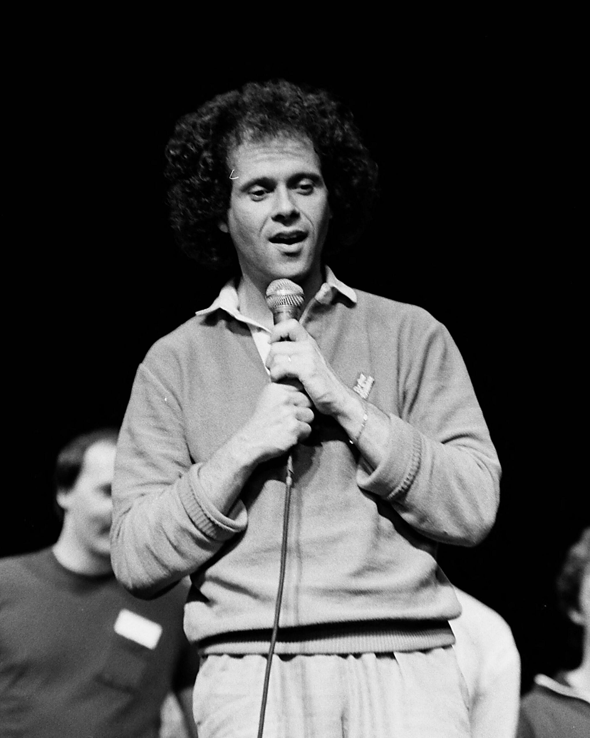 Richard Simmons talking into microphone