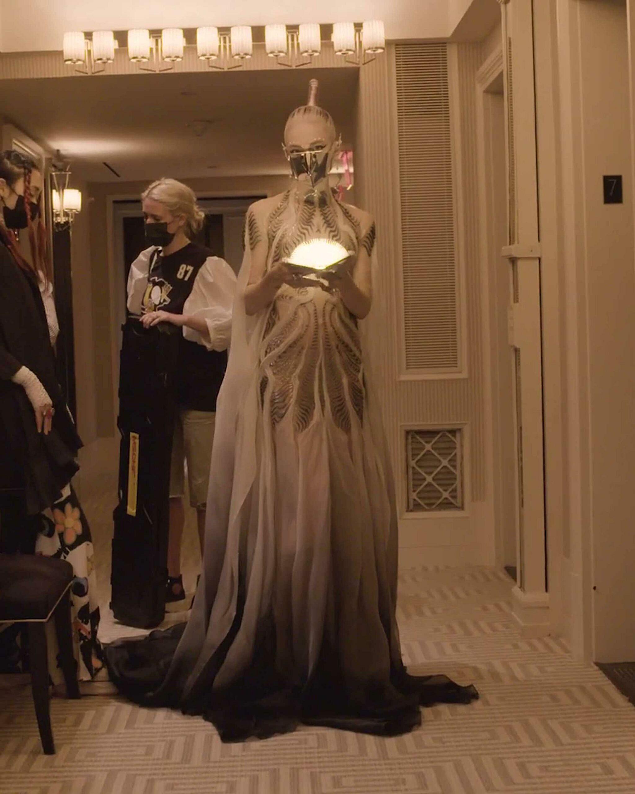 Grimes getting ready for the 2021 Met Gala