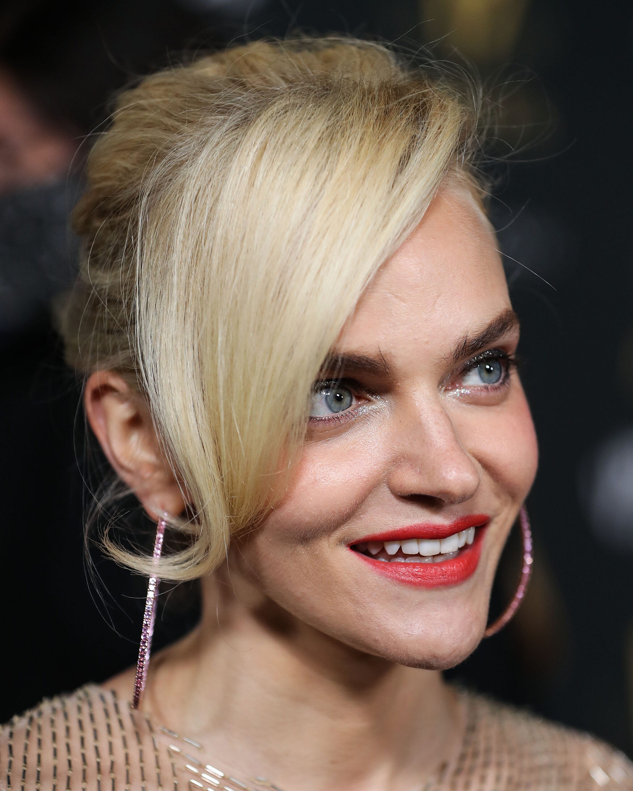 Madeline Brewer wearing a Valentino dress, Alexandre Birman shoes and Kallati earrings arrives at the Television Academy's Reception To Honor 73rd Emmy Award Nominees