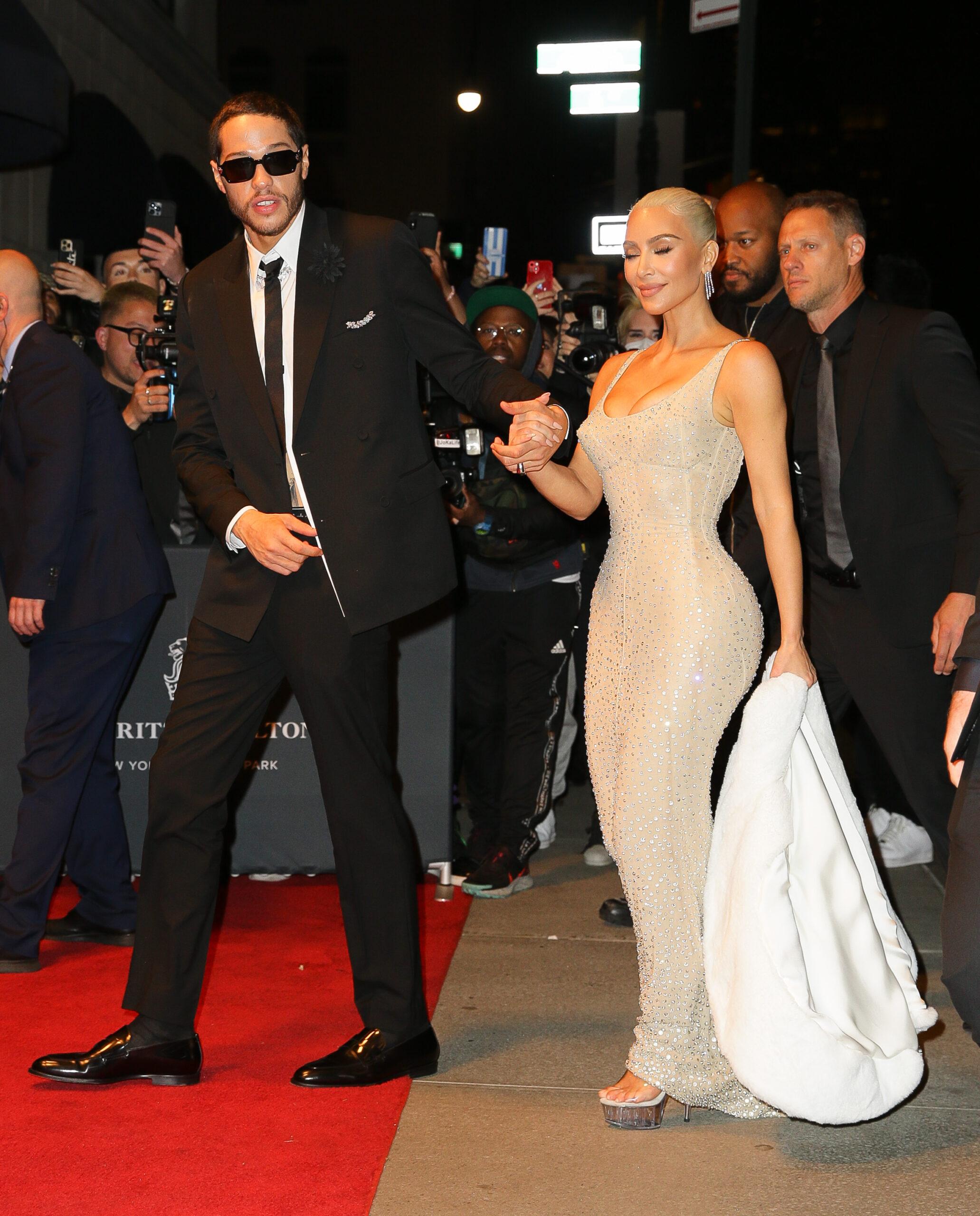 Kim Kardashian and Pete Davidson hold hands while arriving back at their Ritz-Carlton Hotel after attending The MET Gala in New York City