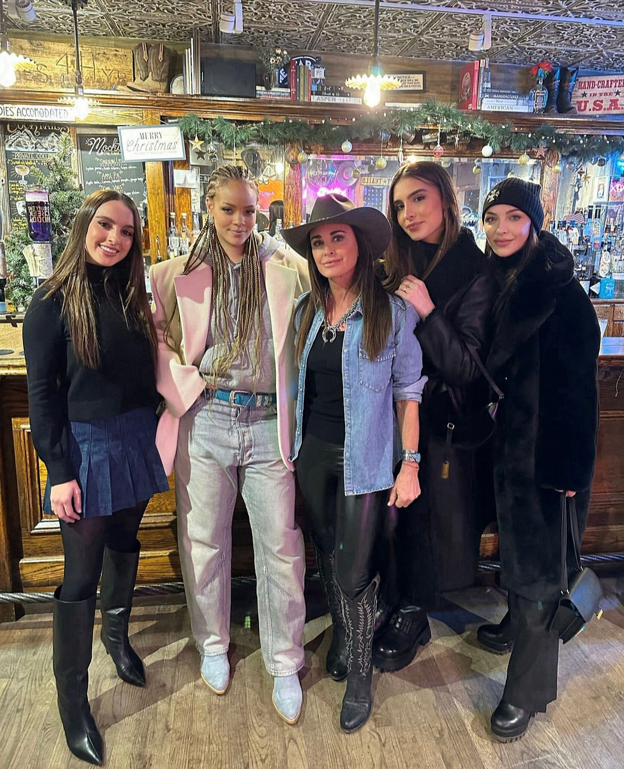 Rihanna poses with Kyle Richards at Western store Kemo Sabe on December 28, with Real Housewives star gifting her a stylish cowboy hat