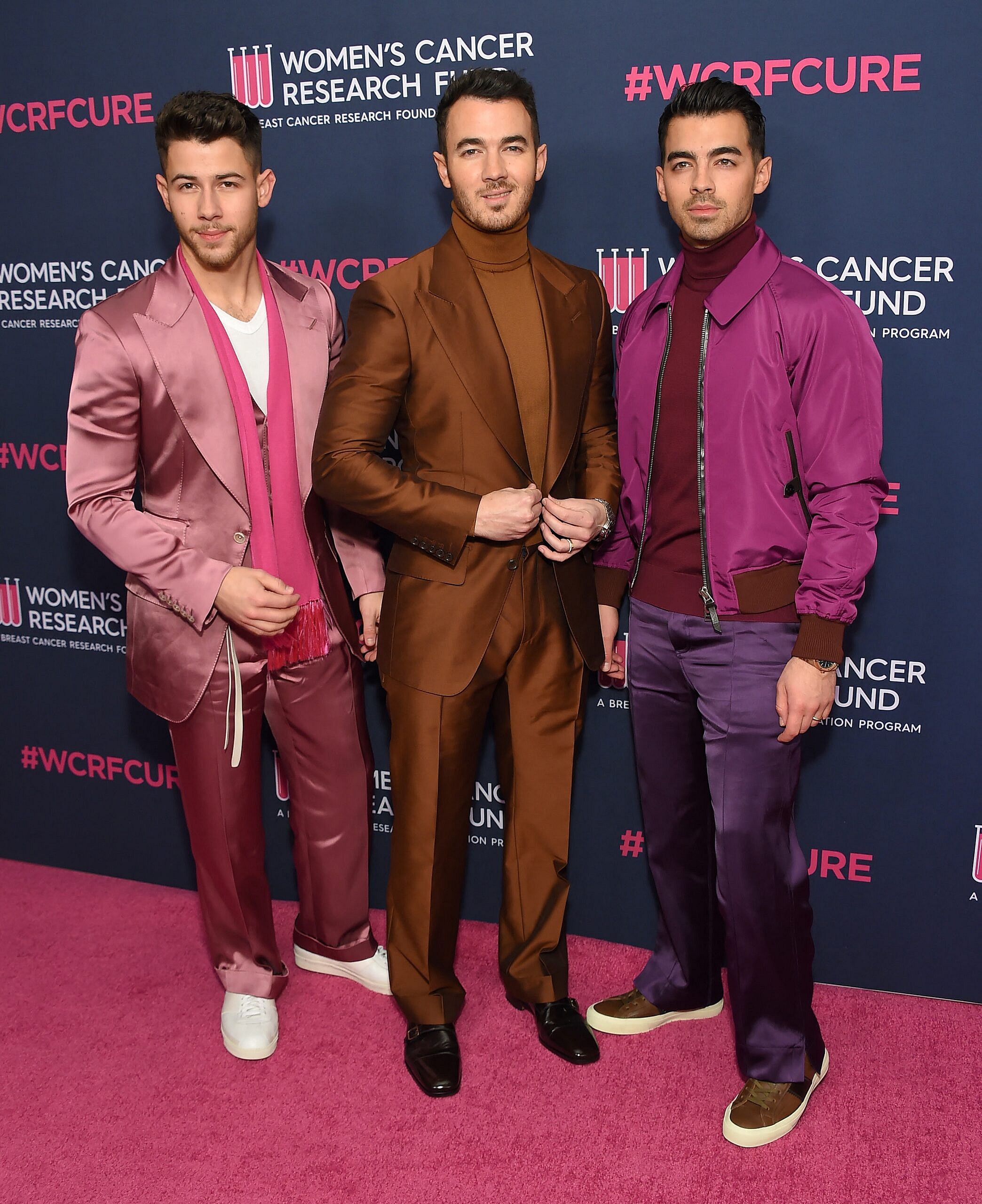 Joe Jonas, Nick Jonas, and Kevin Jonas at An Unforgettable Evening event