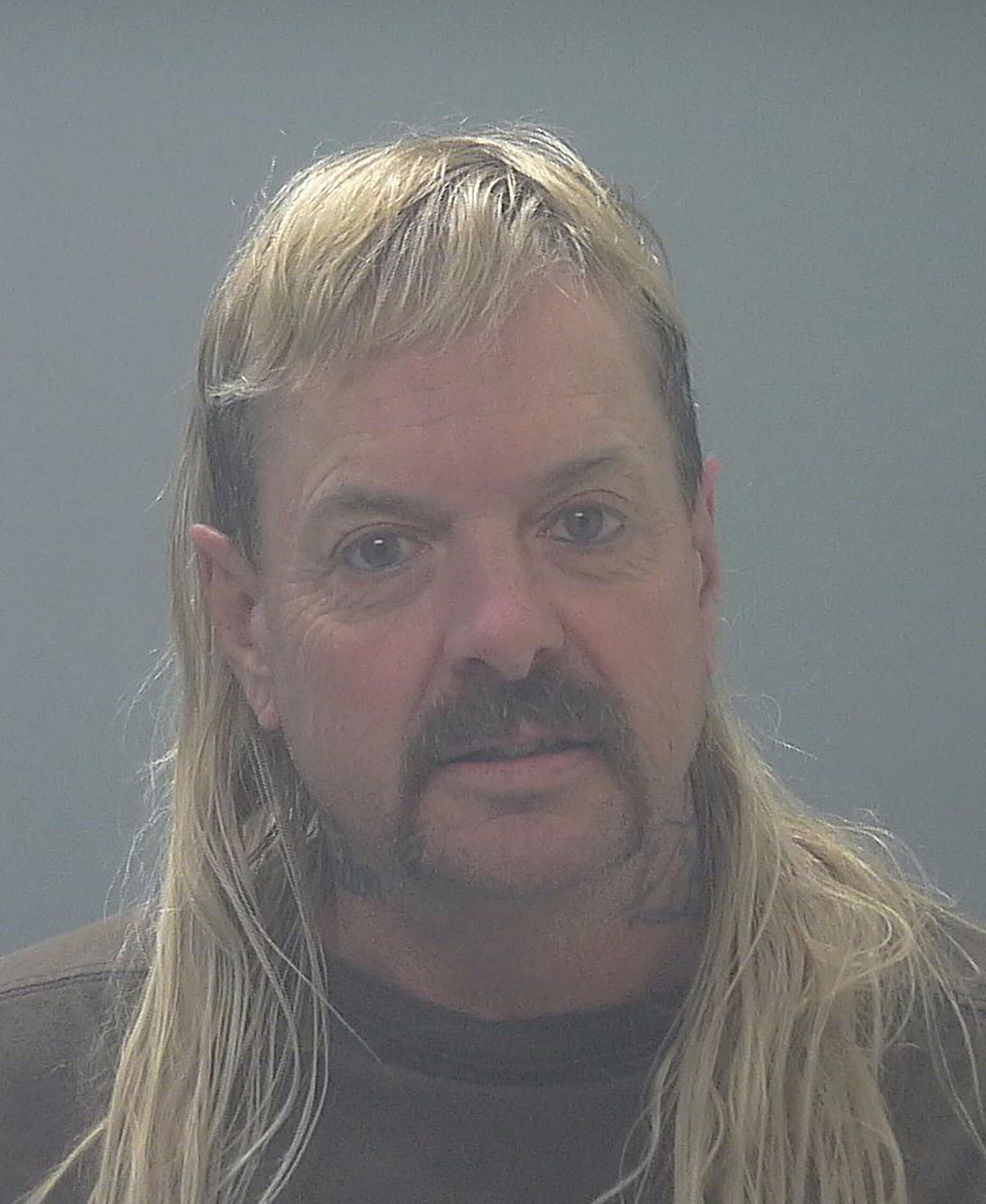 Tiger King star Joe Exotic rocks a longer mullet in new prison booking photo