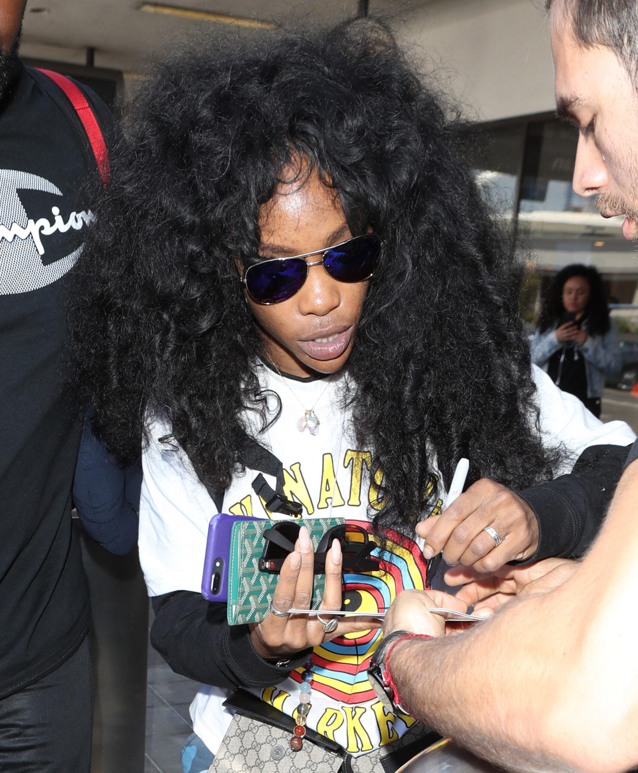 Signing autographs