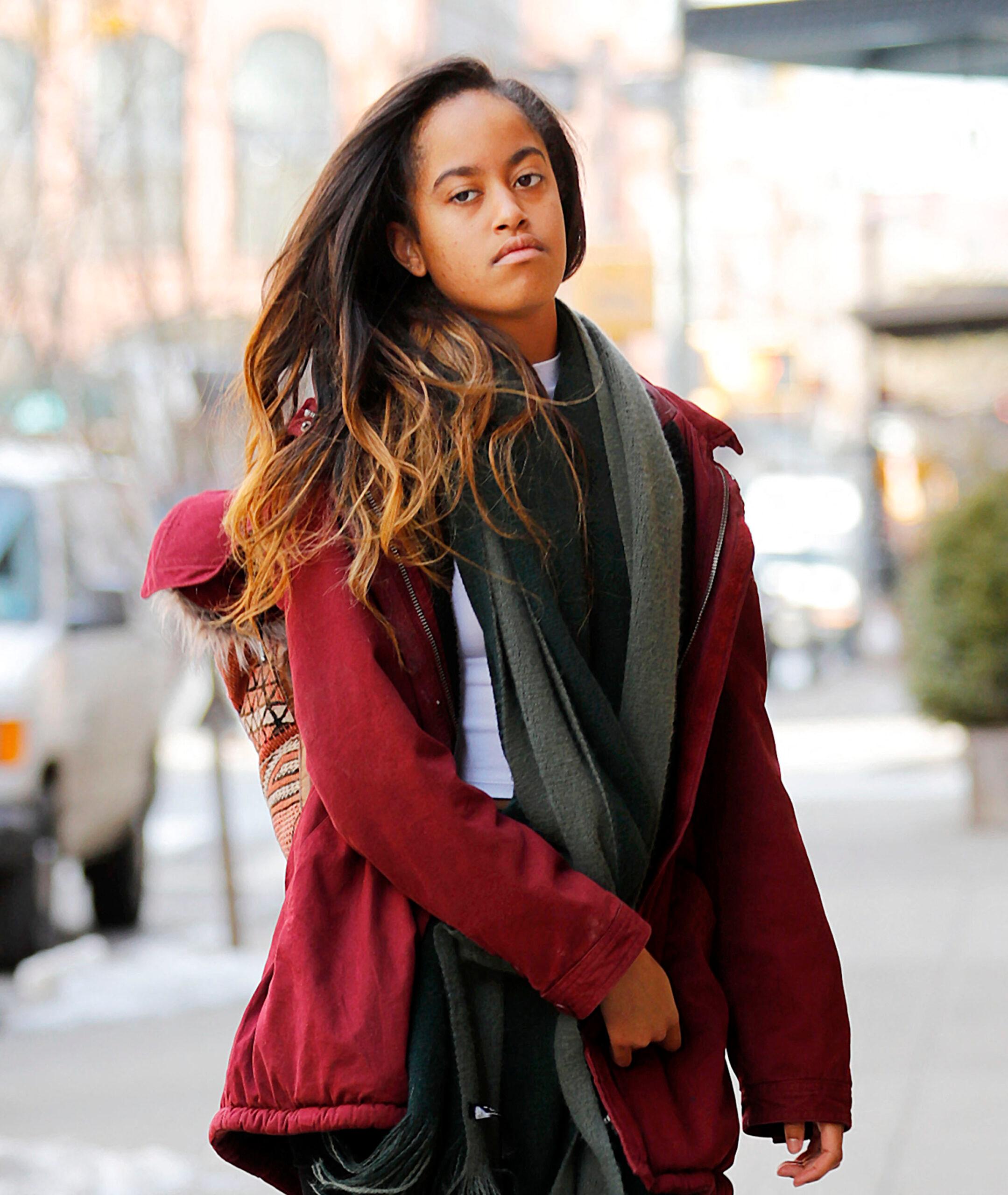 Malia Obama at Stylish former first daughter Malia Obama heads to work in New York wearing a red jacket and a super long scarf