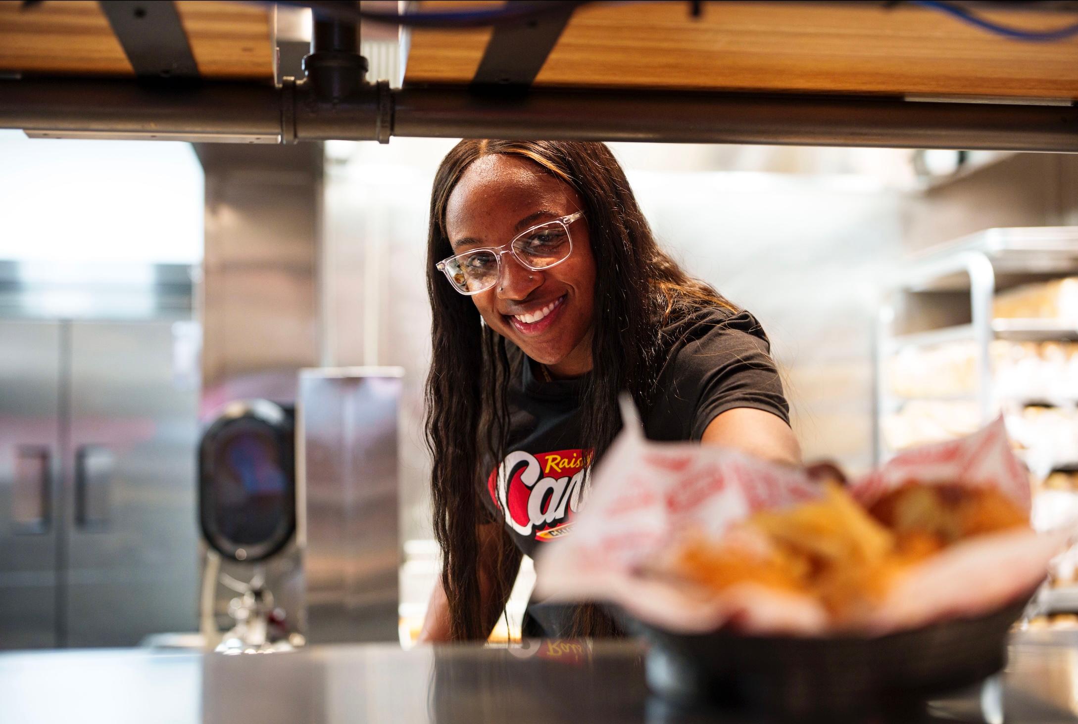 Jackie Young working a "shift" at Raising Cane's in Las Vegas