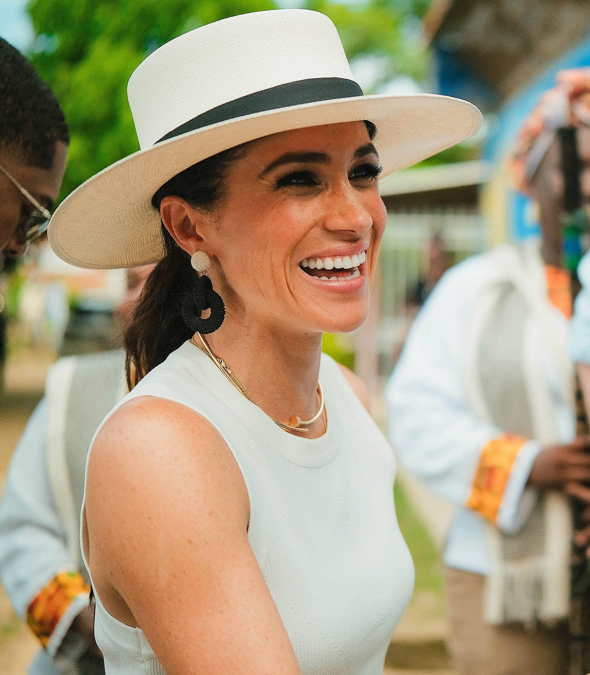 Meghan Markle Accessorises with Princess Diana’s Gold Cartier Tank Watch During Her Trip to Colombia