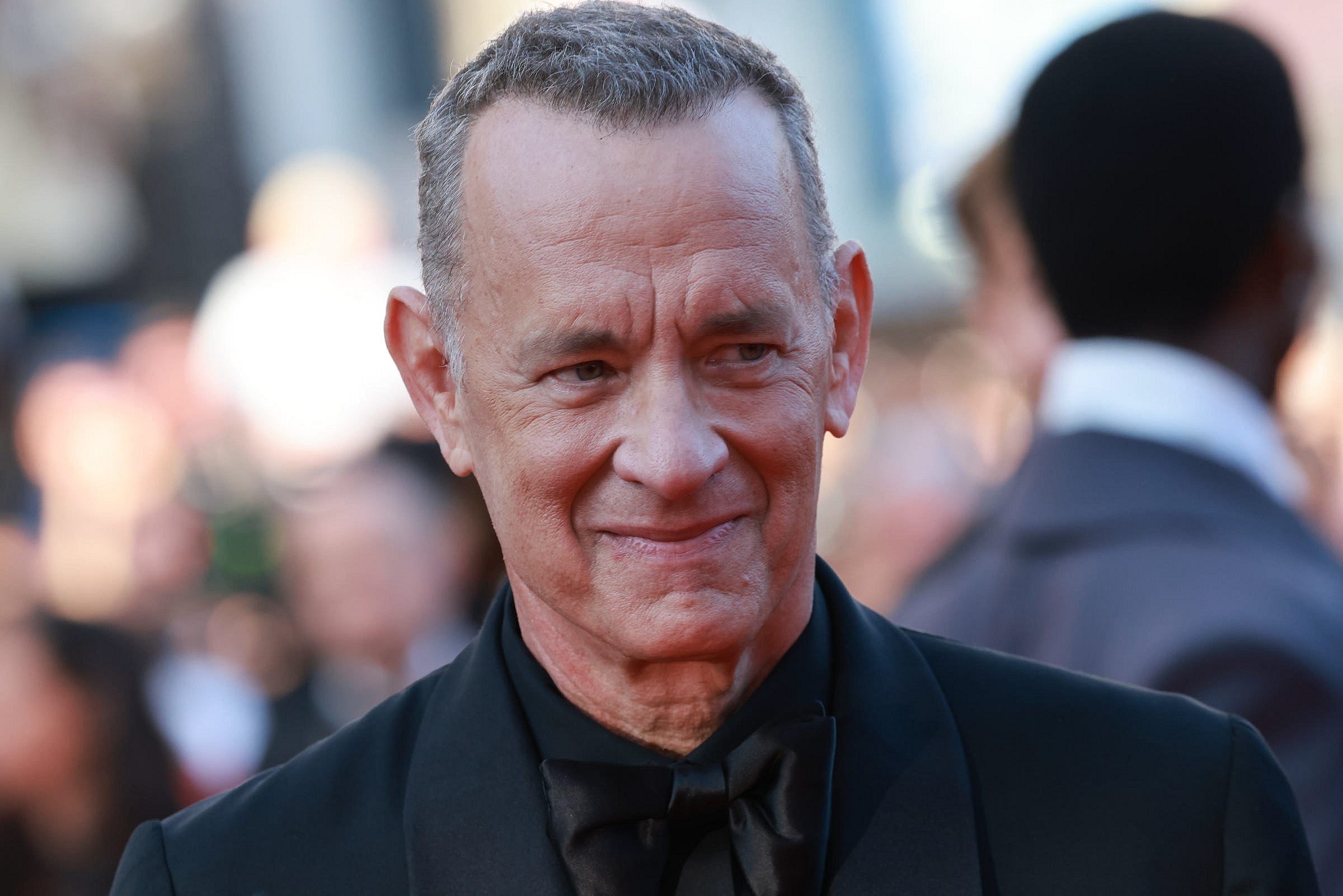 US actor Tom Hanks (L) and Actor Alton Mason arrive for the screening of the film "Elvis" during the 75th edition of the Cannes Film Festival in Cannes, southern France, on May 25, 2022.