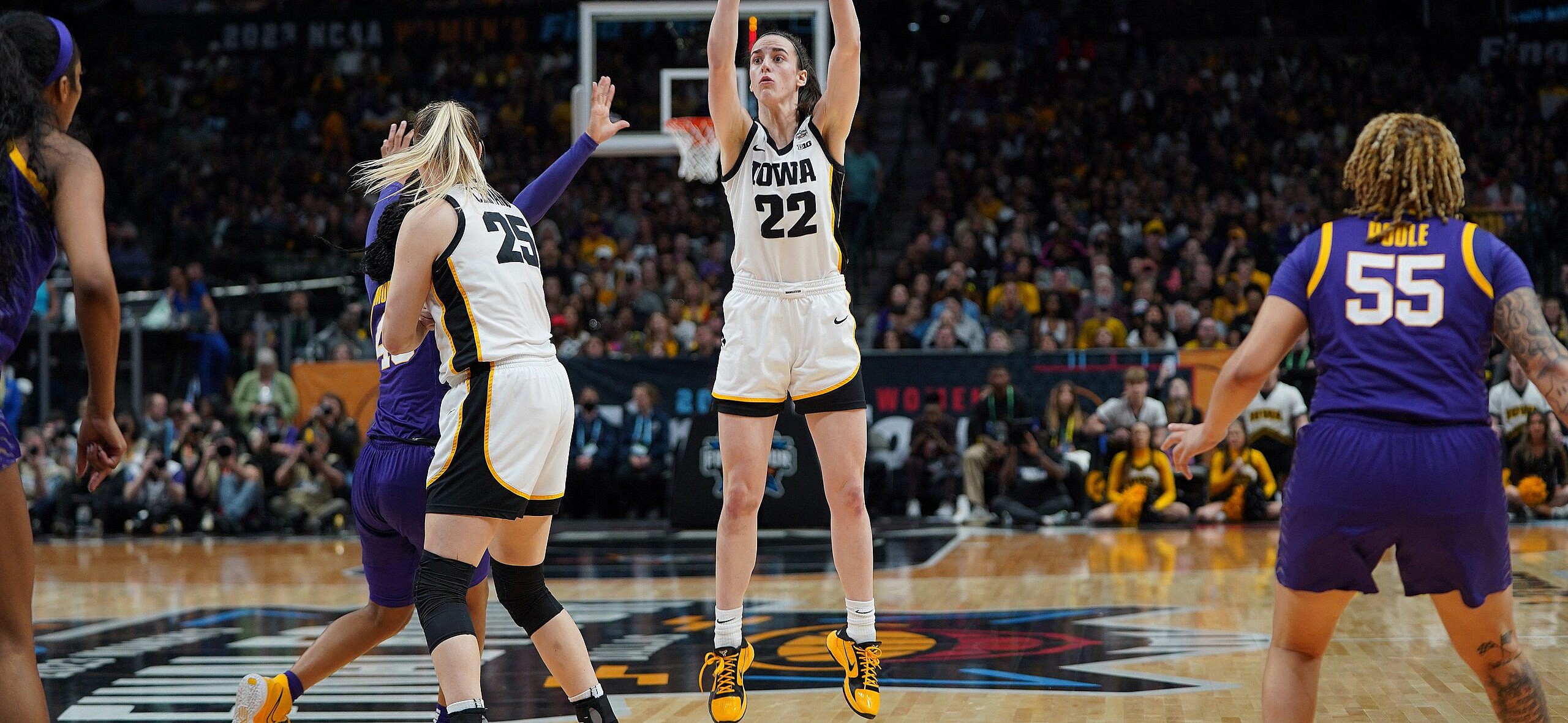 Caitlin Clark shooting a basketball during the championship game against LSU in 2023.