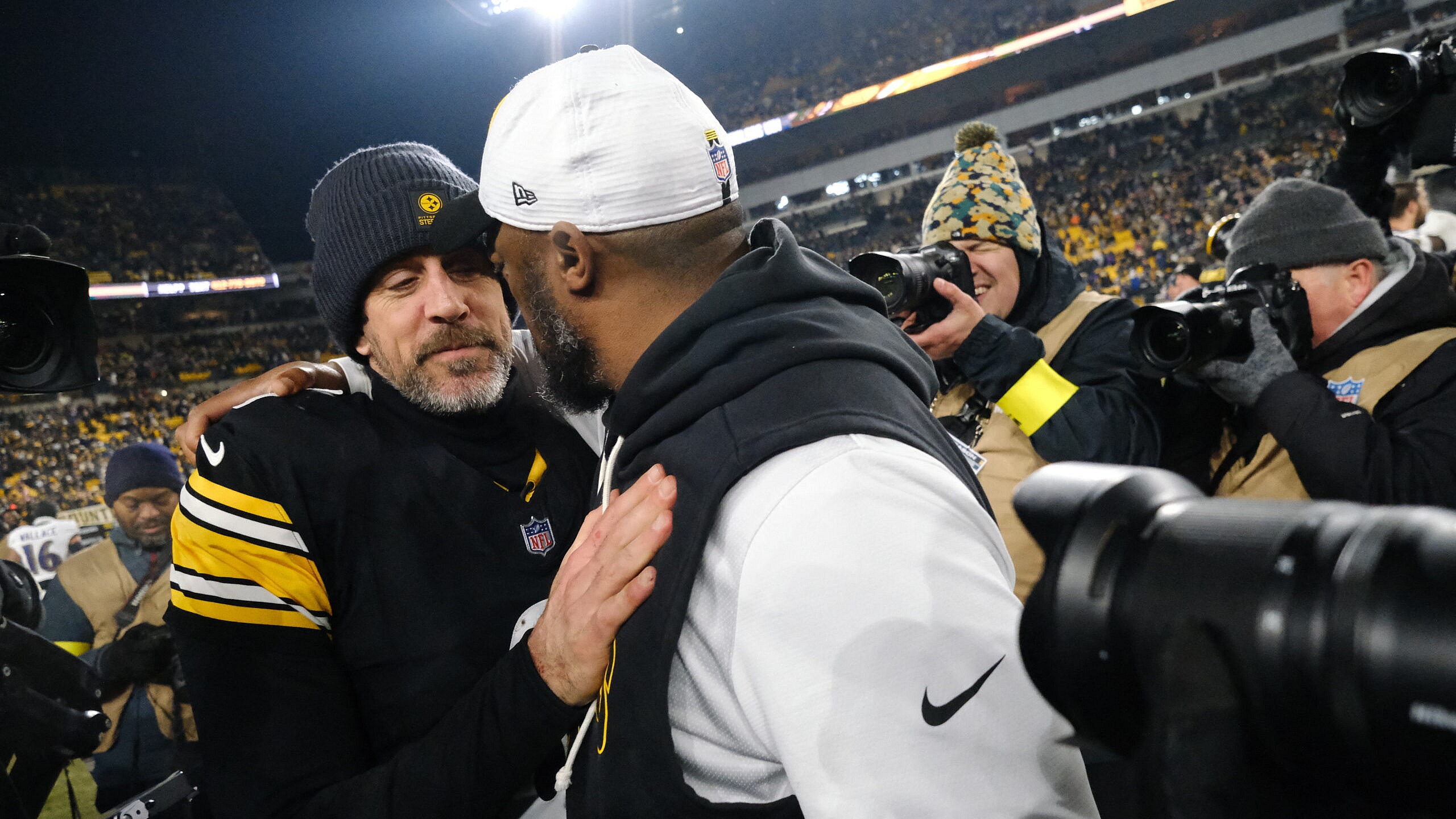 Mike Tomlin and Aaron Rodgers. 
