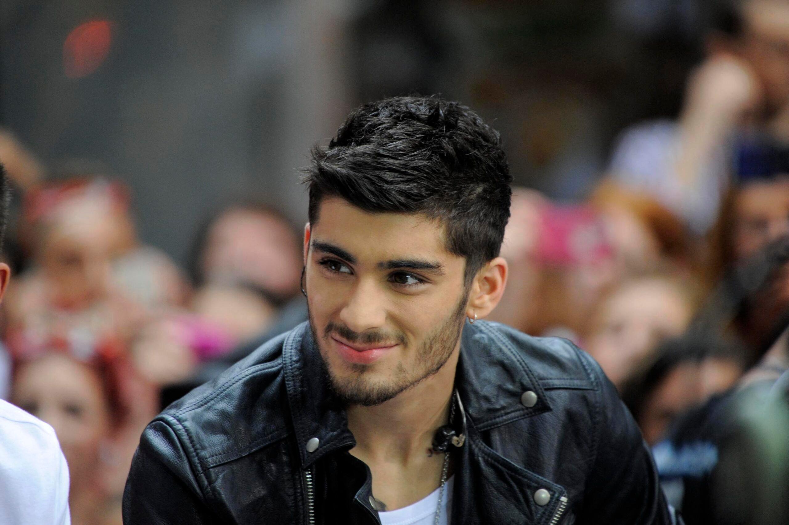 Zayn Malik wearing a leather jacket
