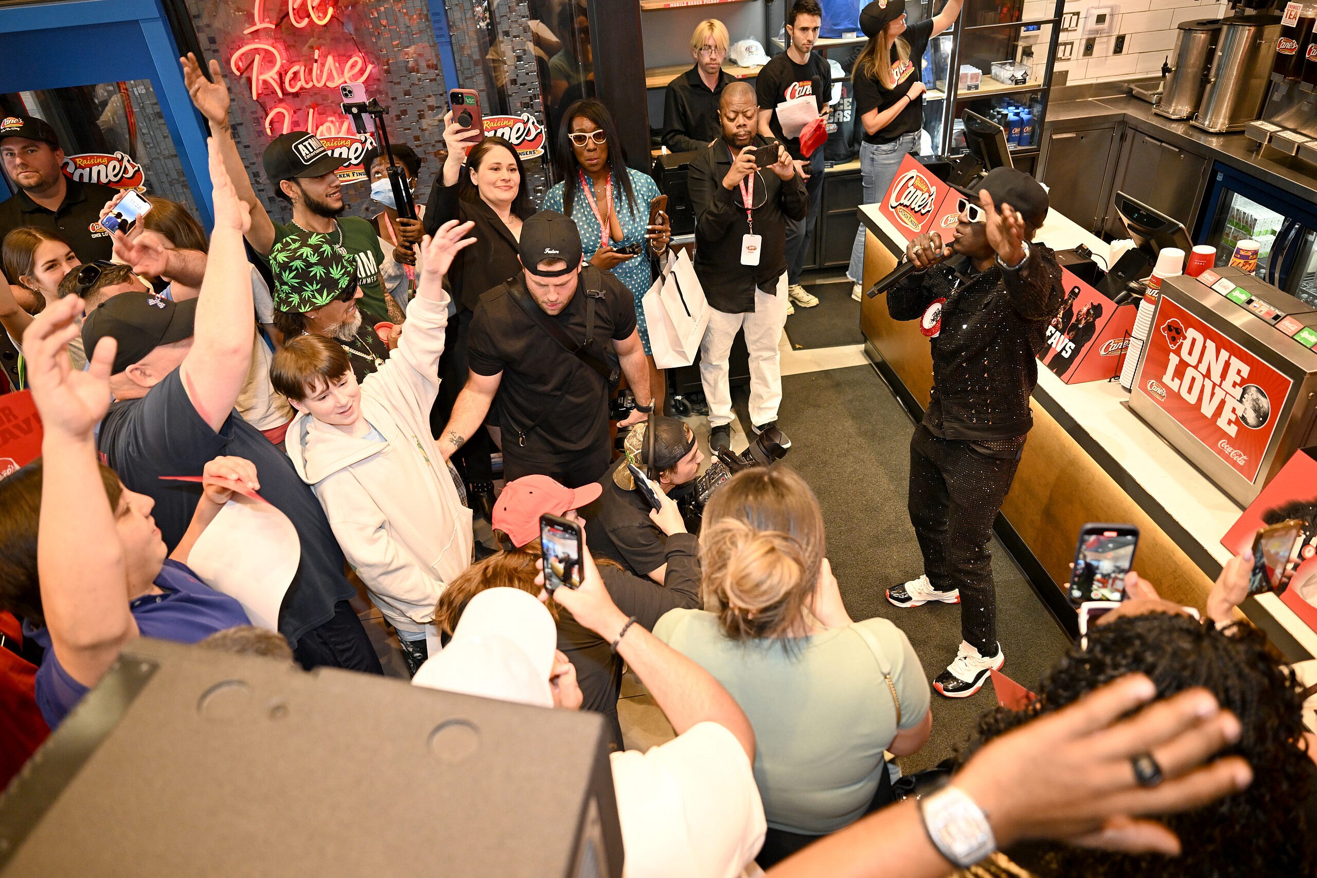 Pop Culture Icon Flavor Flav Works "Shift" at Raising Cane's Las Vegas Ahead of Cane's New "Flavor Fast" Campaign