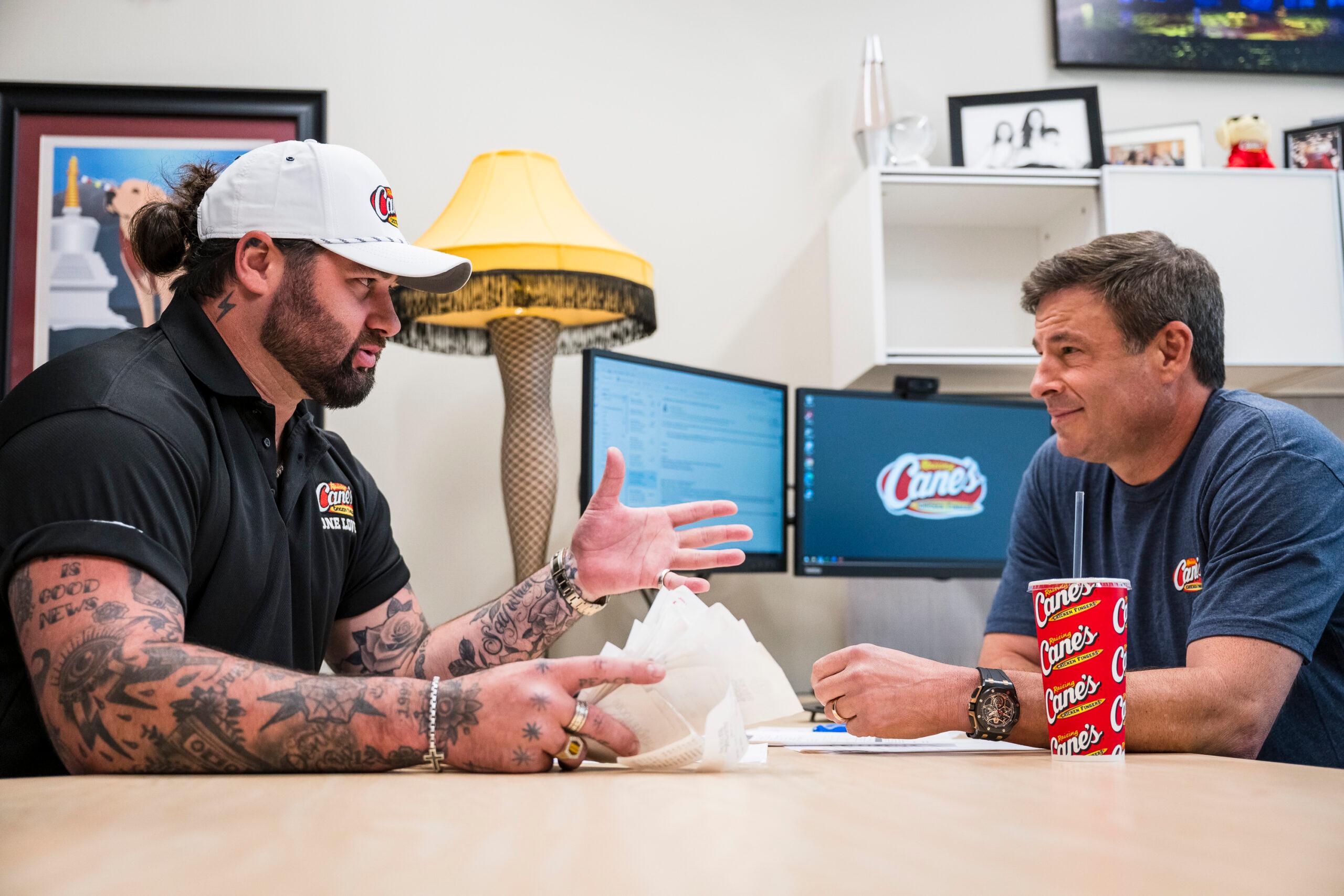 Singer/Songwriter Koe Wetzel and Raising Cane’s CEO Todd Graves at Raising Cane’s corporate office 