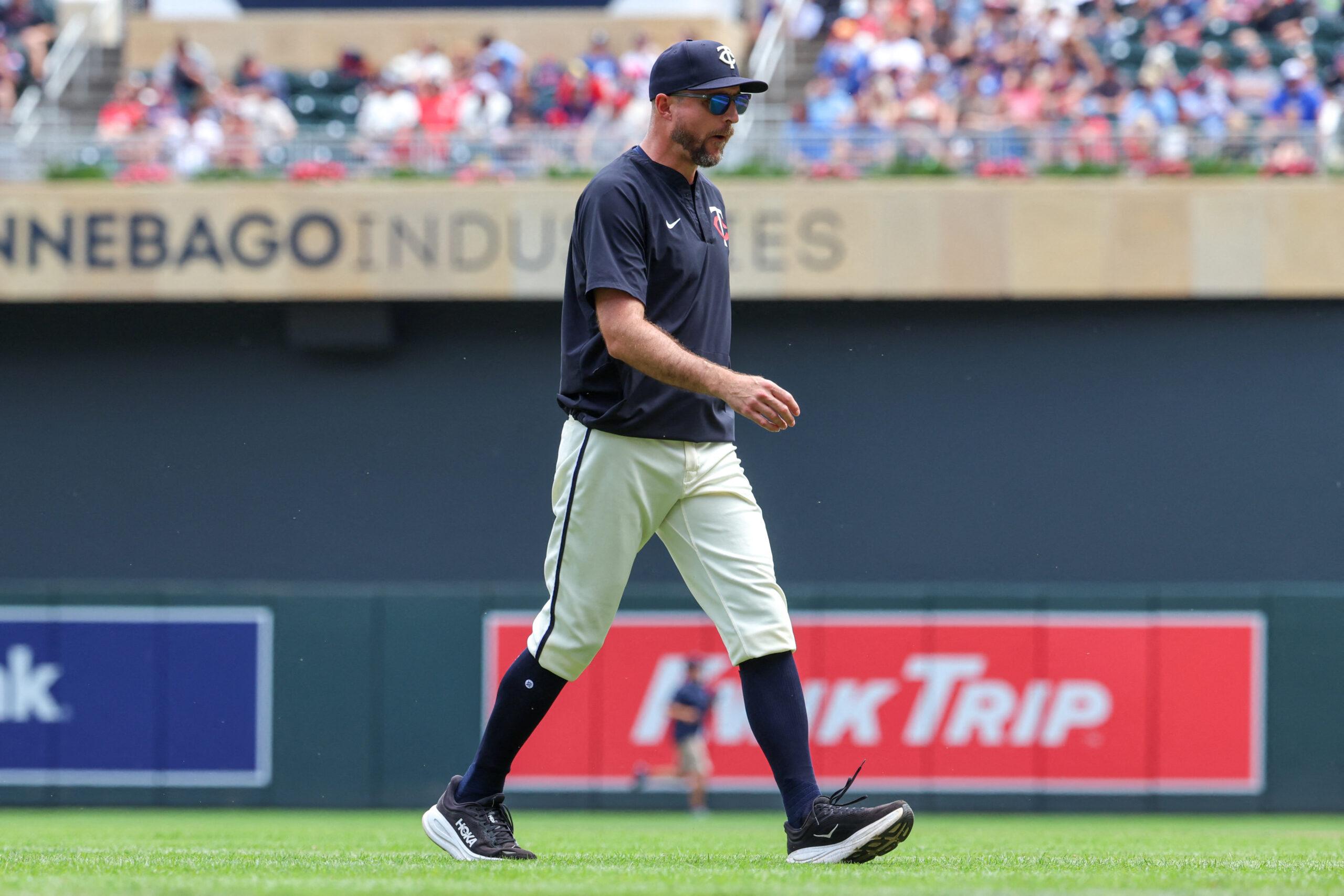 Rocco Baldelli walking onto MLB field