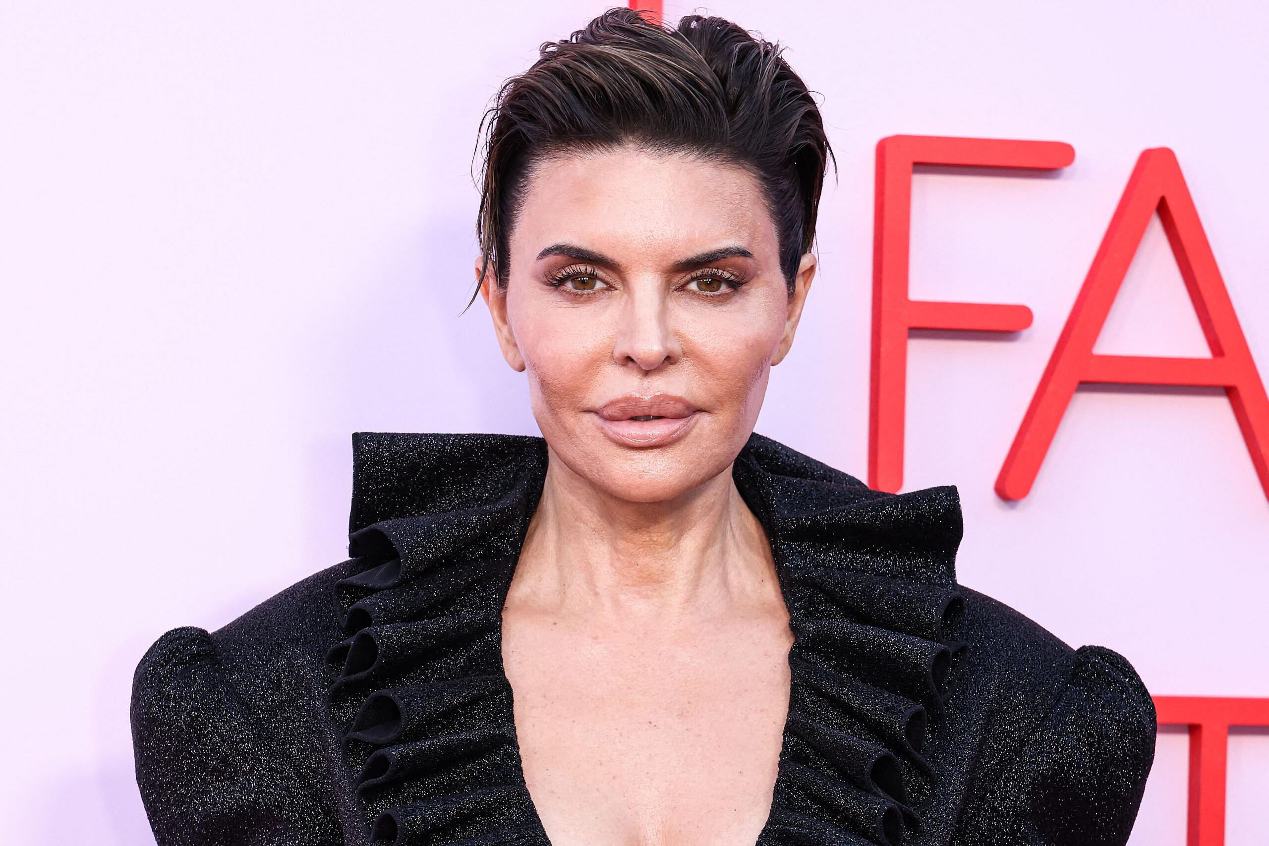 Lisa Rinna Turns Heads With Bold Wigs At Paris Couture Week