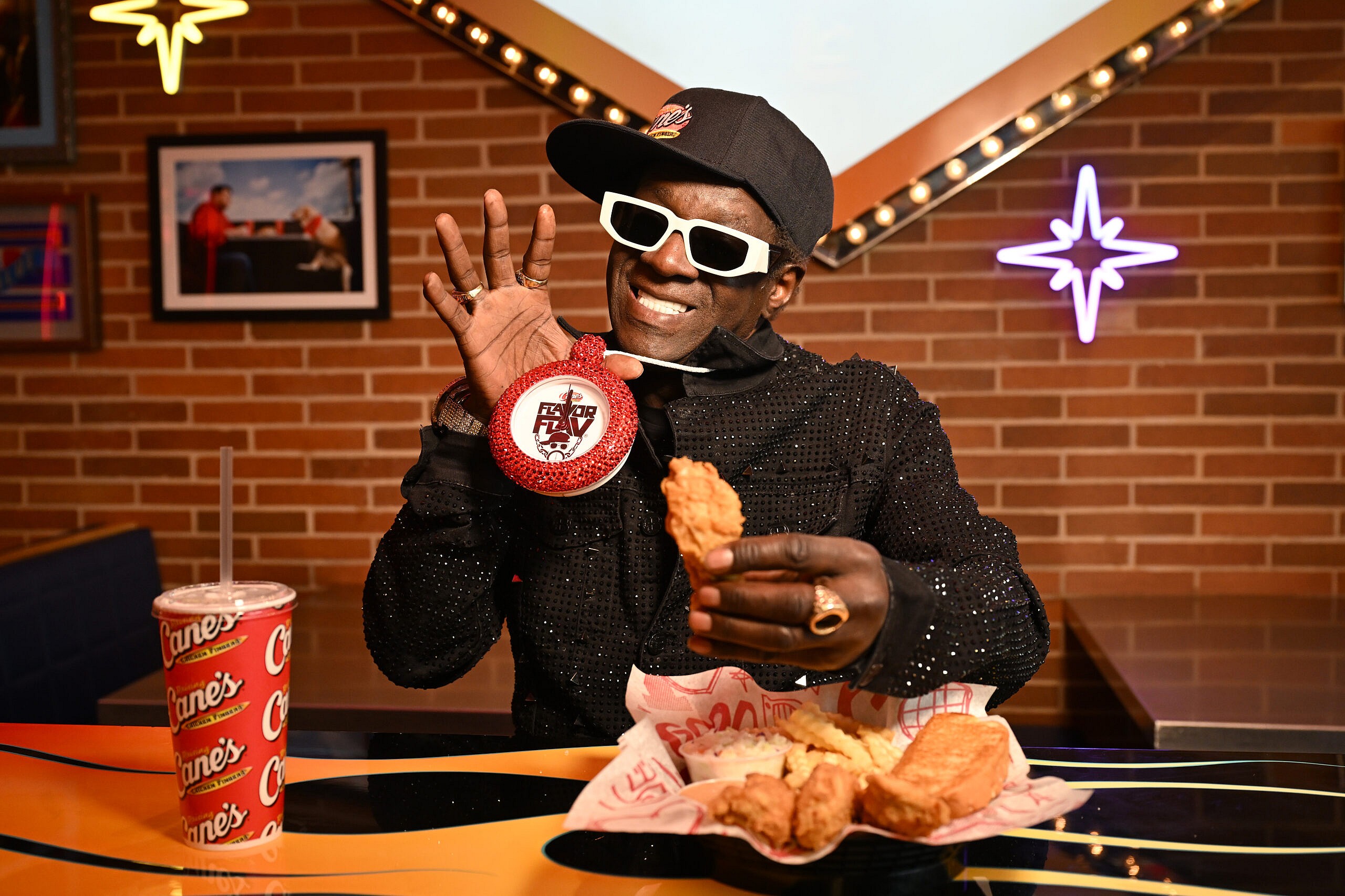 Pop Culture Icon Flavor Flav Works "Shift" at Raising Cane's Las Vegas Ahead of Cane's New "Flavor Fast" Campaign