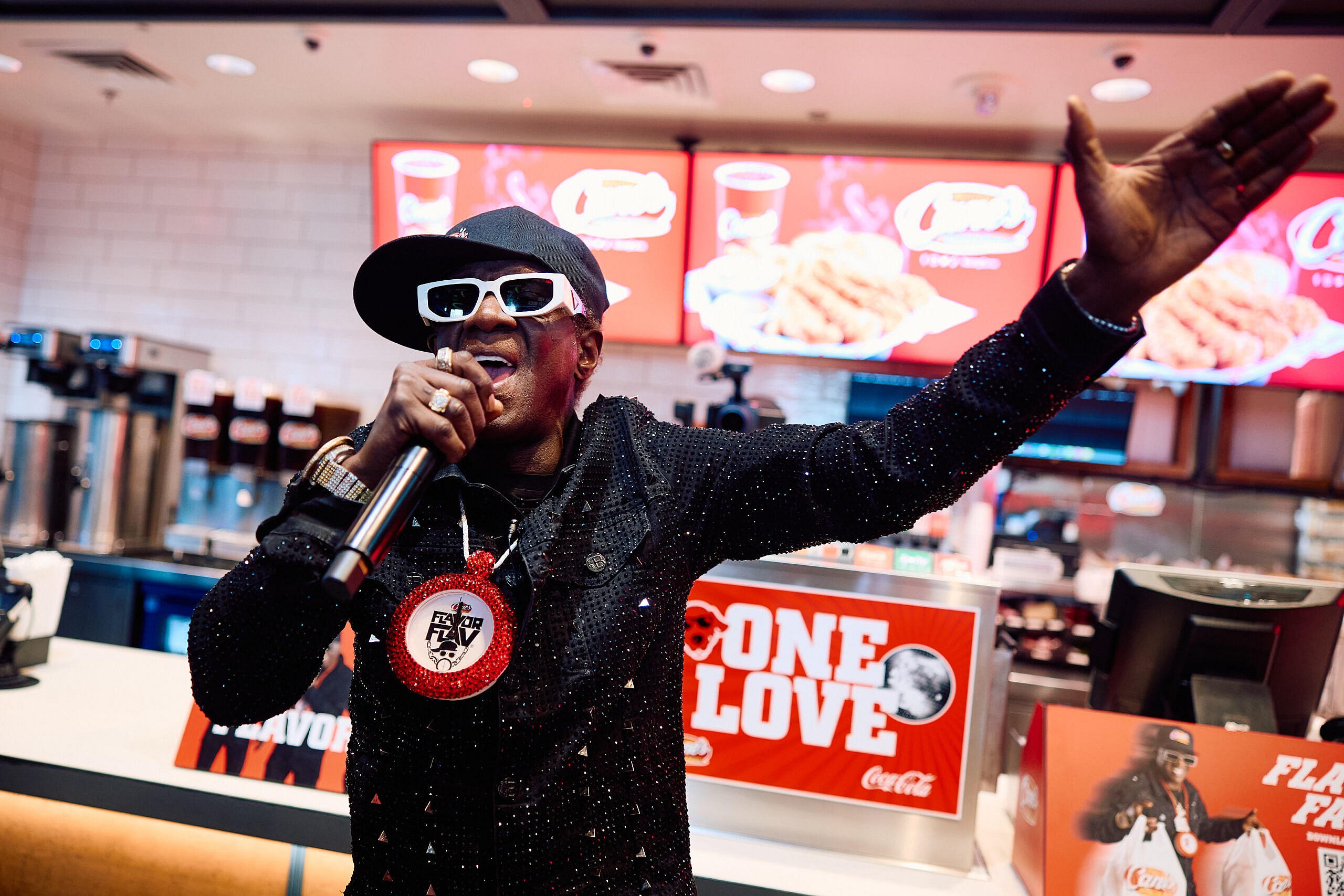 Pop Culture Icon Flavor Flav Works "Shift" at Raising Cane's Las Vegas Ahead of Cane's New "Flavor Fast" Campaign