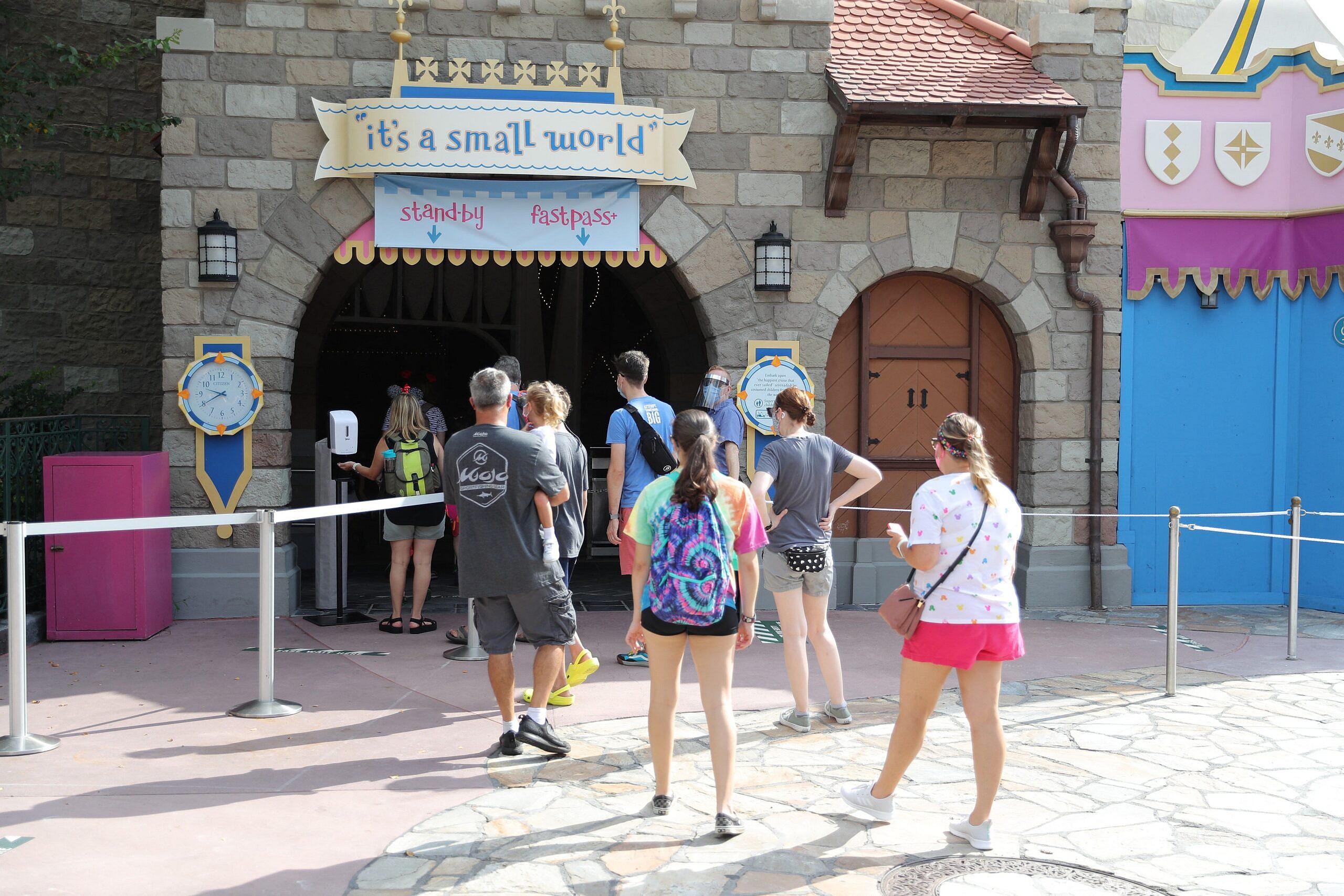 Guests walking into its a small world at Disney World