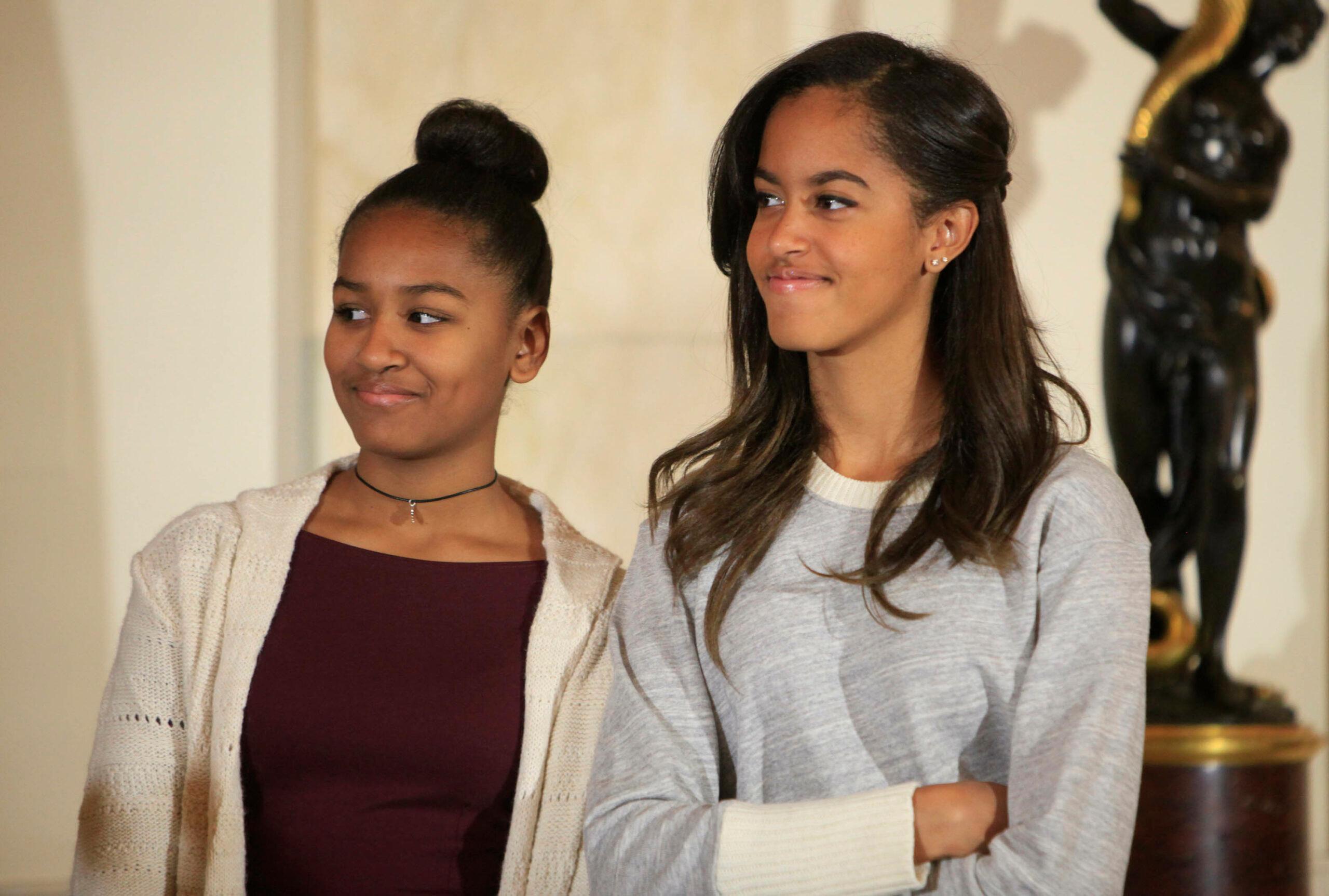 Sasha Obama & Malia Obama at Obama pardons Thanksgiving Turkey 2014