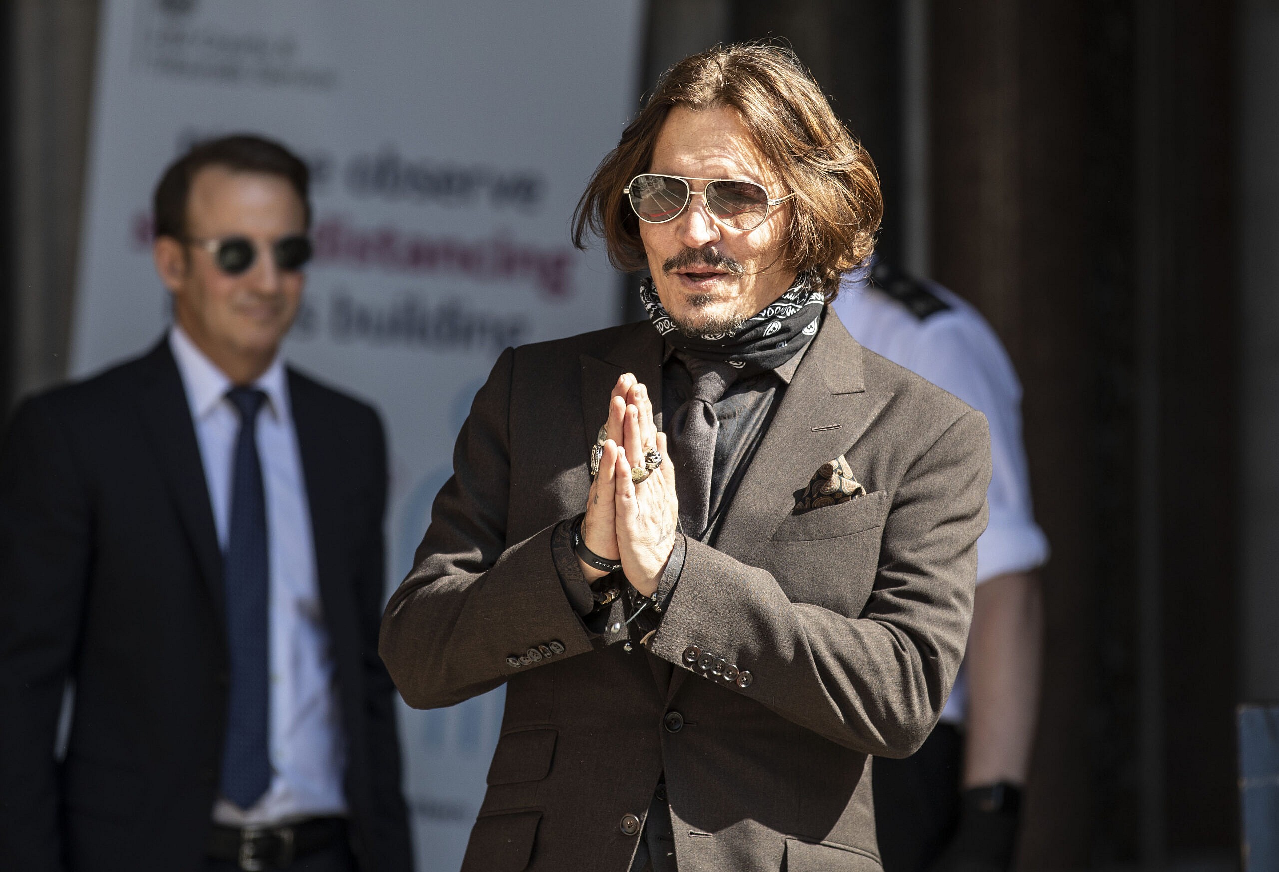 Actor Johnny Depp arrives at the High court in London as the legal action against The Sun newspaper continues.