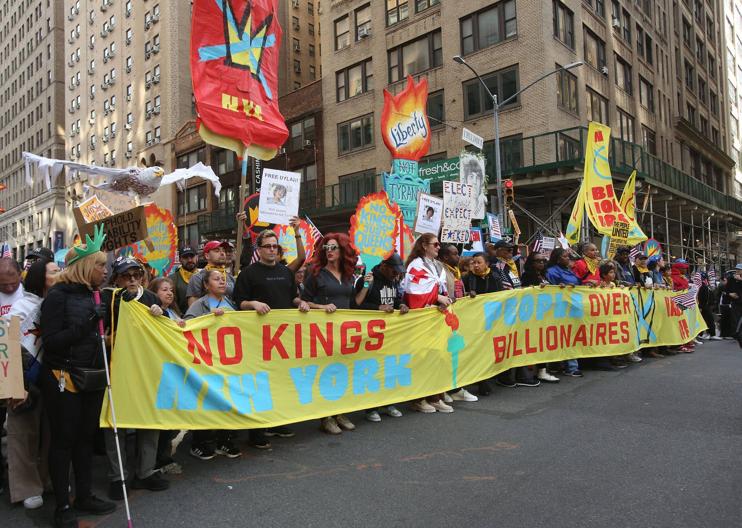 Women carry an ICE sign during the ''No Kings'' protest in New York