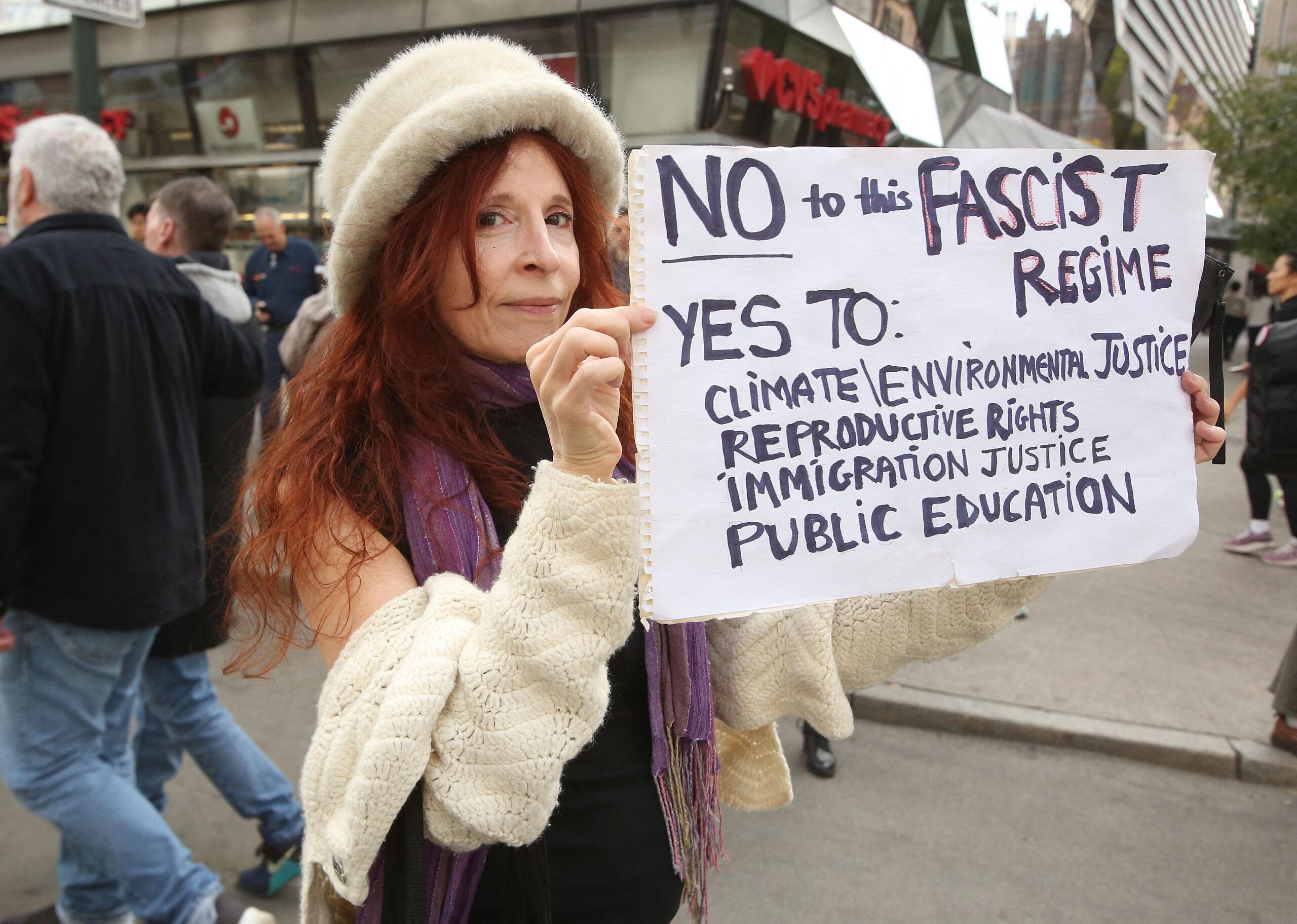 Women carry an ICE sign during the ''No Kings'' protest