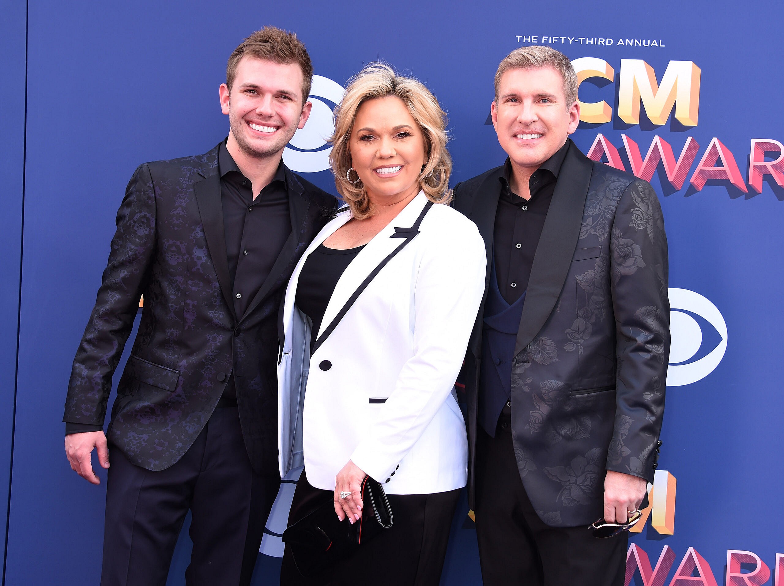 Chase Chrisley, Julie Chrisley and Todd Chrisley. 