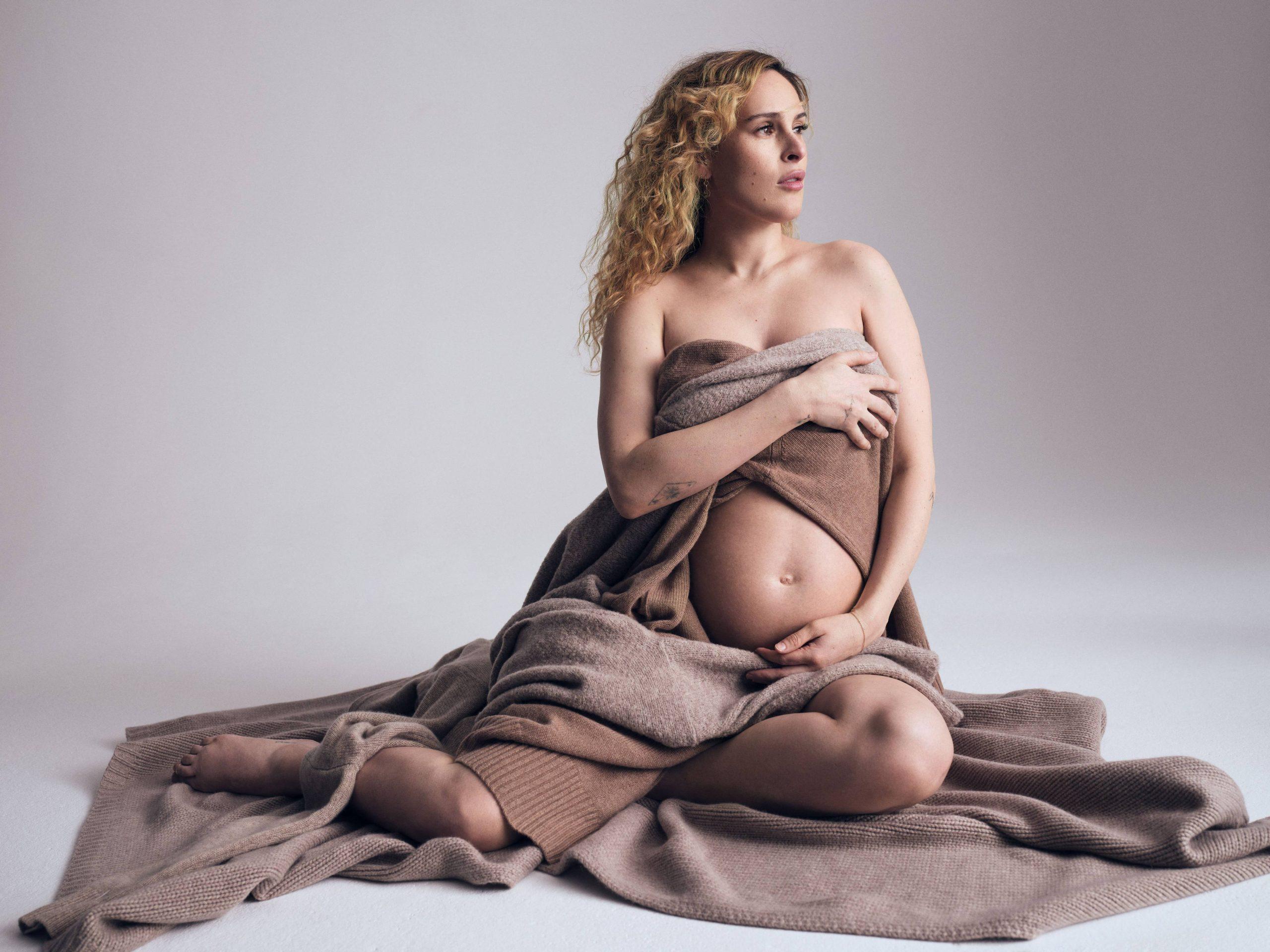 Rumer Willis shares baby bump as she poses for Naked Cashmere