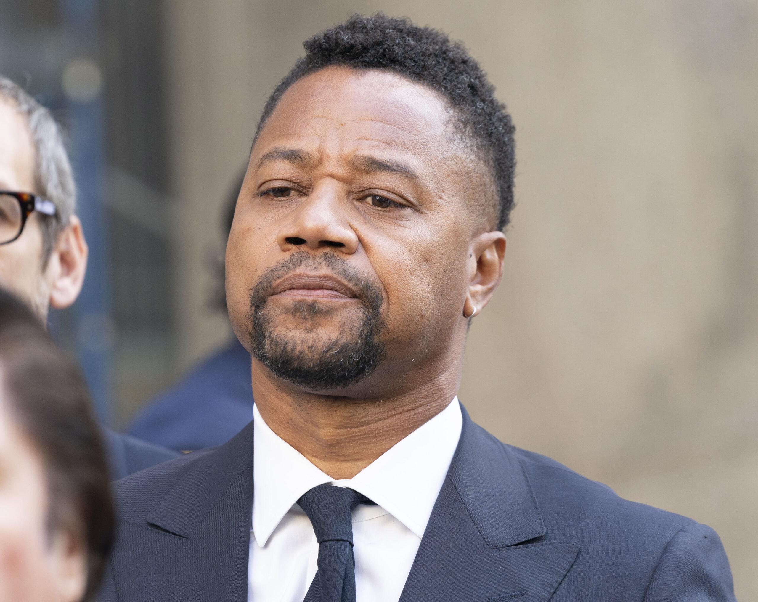 October 15, 2019, New York, United States: Actor Cuba Gooding Jr. listens as attorney Mark Heller addresses press after arraignment in Manhattan's New York State Supreme Court. 15 Oct 2019