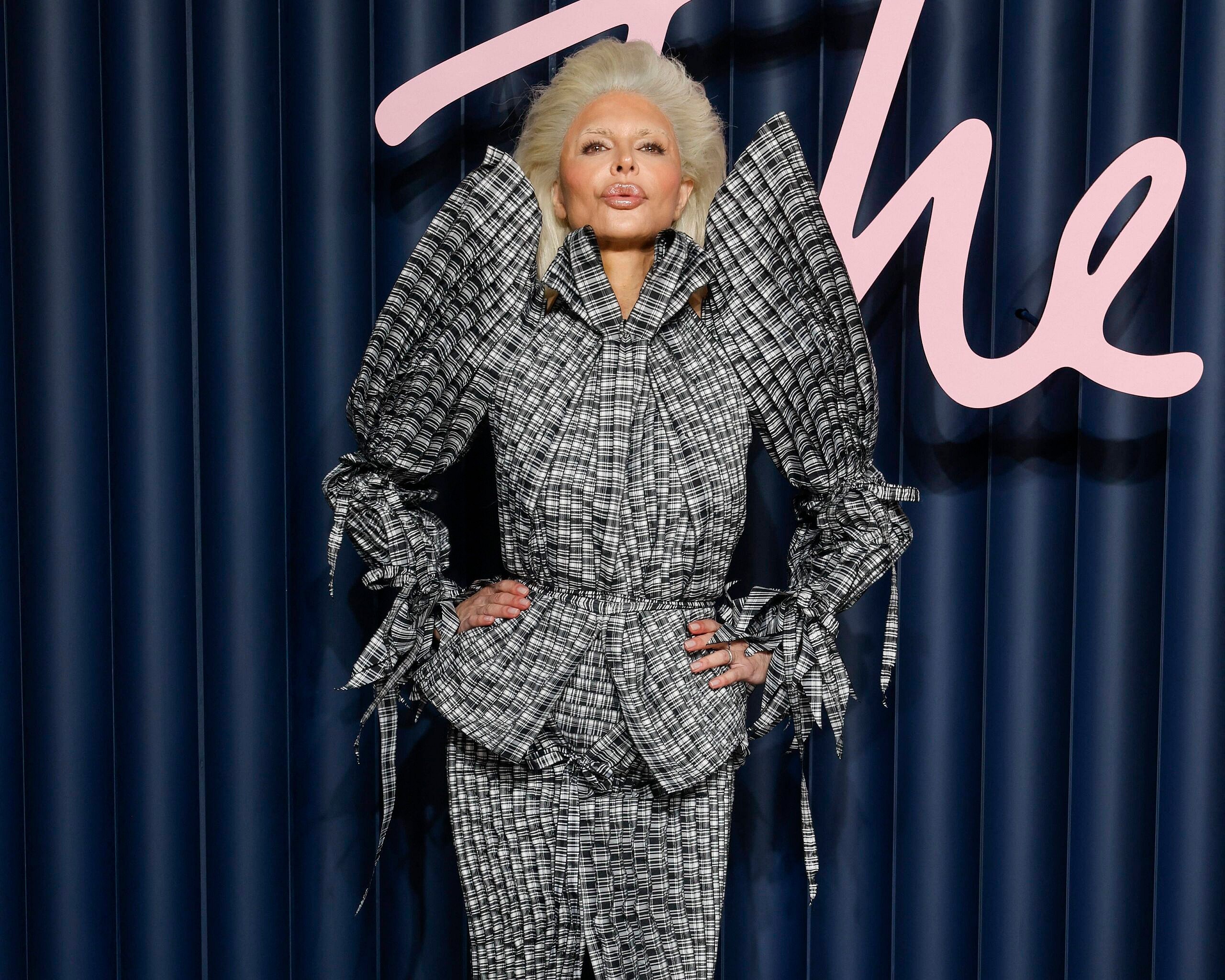 Rinna wearing a grey dress