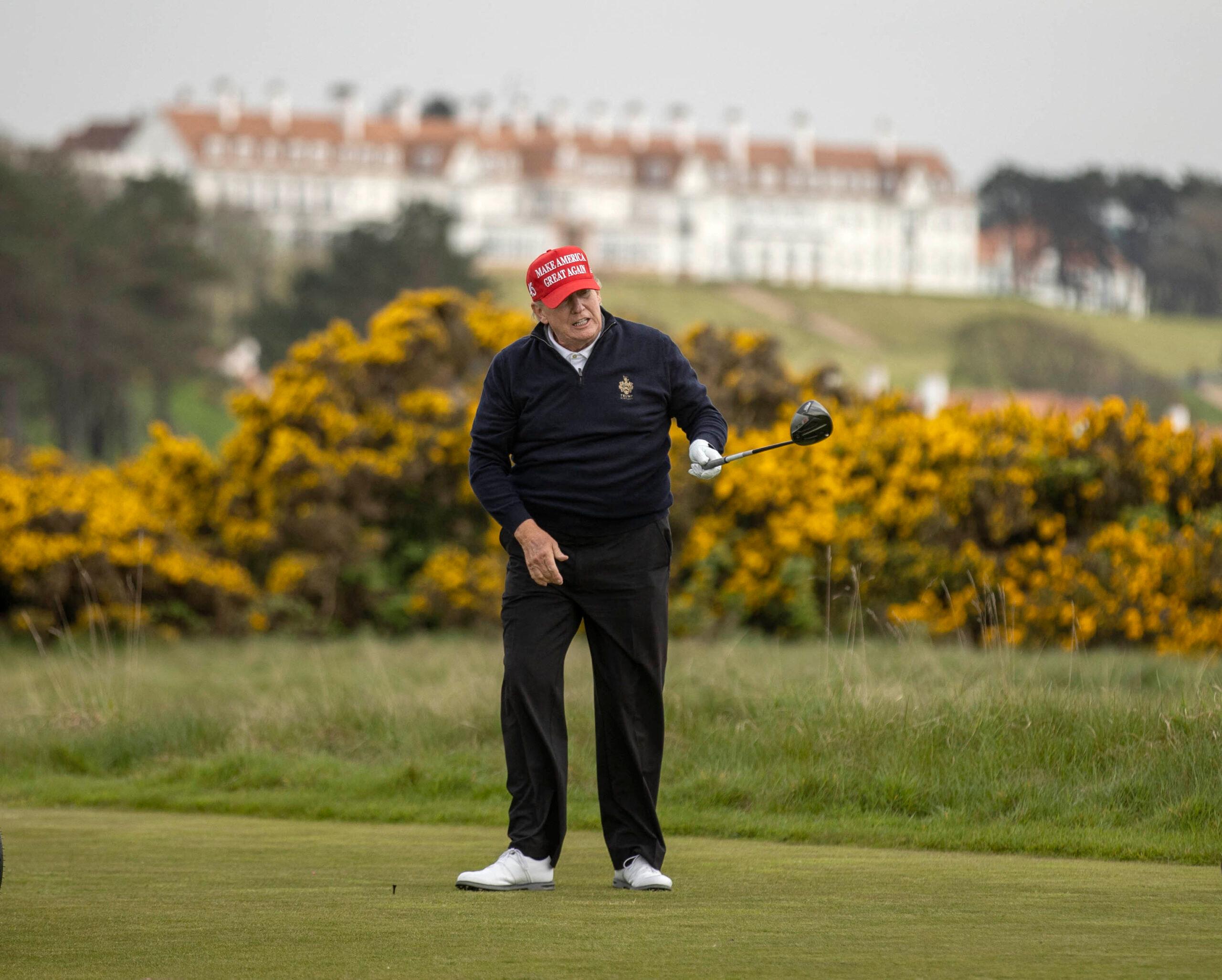 Donald Trump playing golf at his Trump Turnberry resort in South Ayrshire